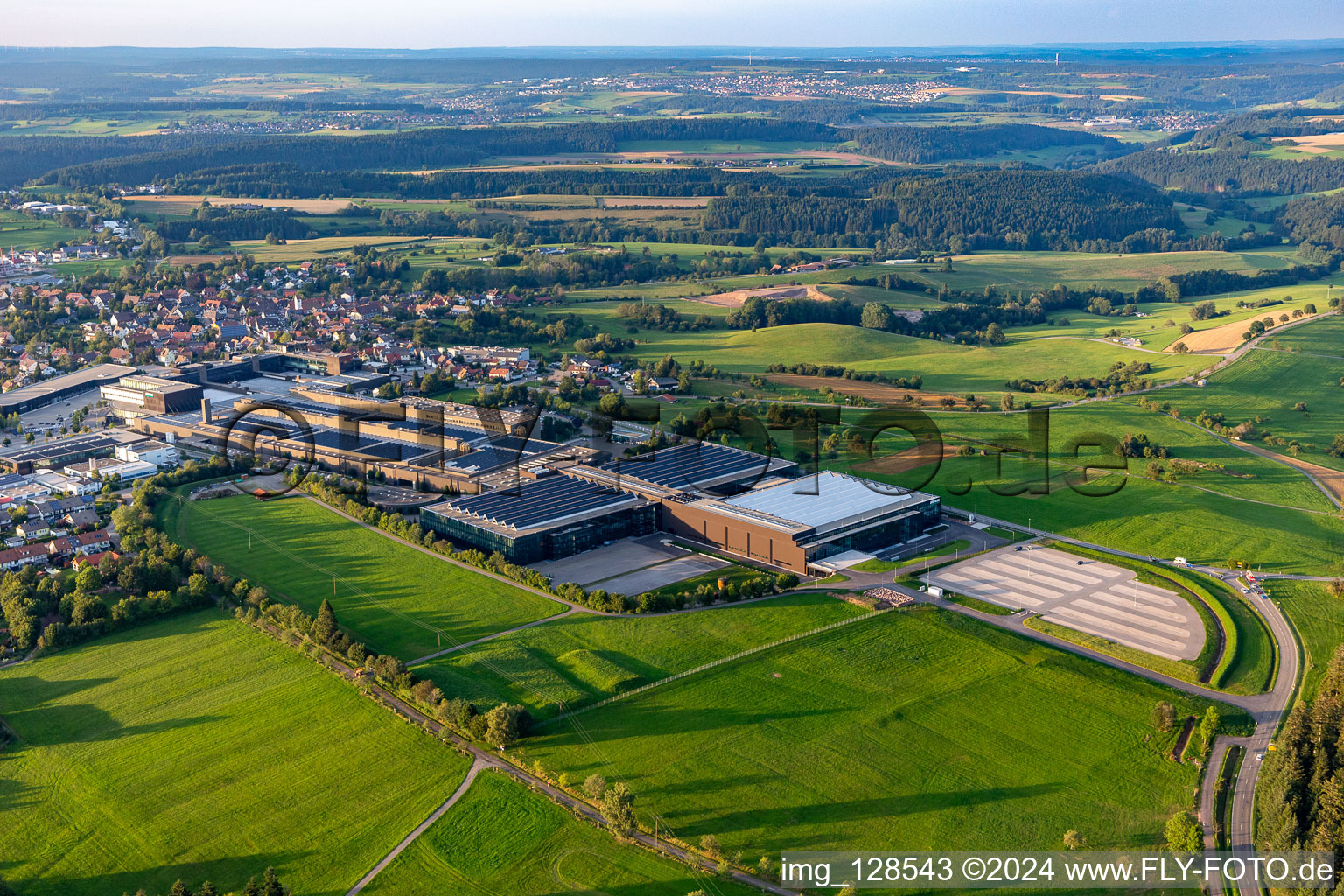 Aerial view of Building and production halls on the premises of ARBURG GmbH + Co KG in Lossburg in the state Baden-Wuerttemberg, Germany