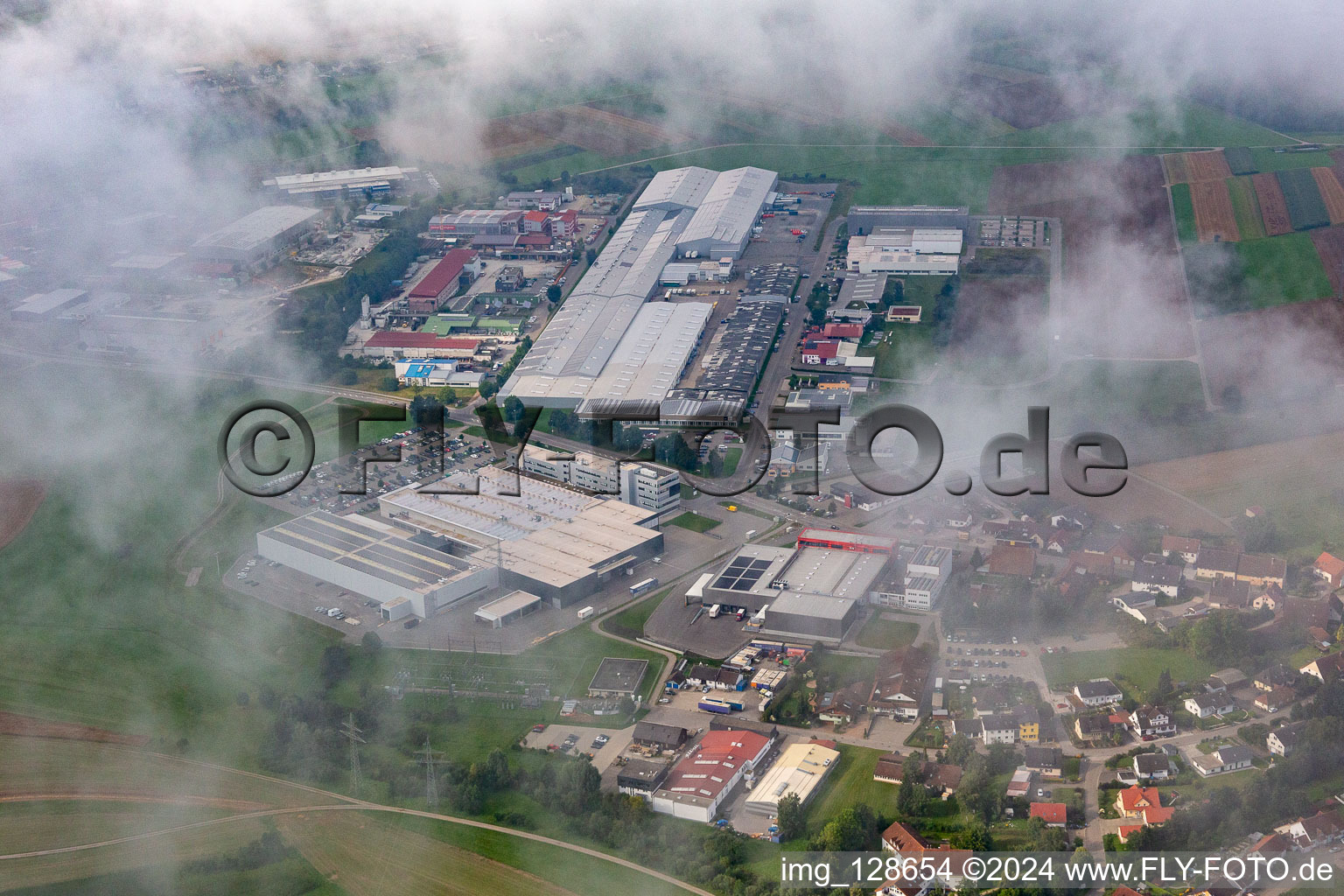 Factory under clouds: Concrete - precast - Union GmbH & Co. KG; Schwäbische Werkzeugmaschinen GmbH, KMS Automation GmbH in the district Waldmössingen in Schramberg in the state Baden-Wuerttemberg, Germany