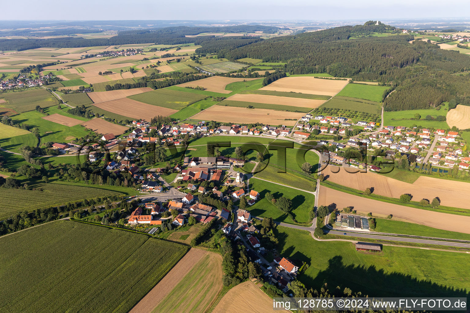 Agricultural land and field boundaries surround the settlement area of the village in Goeffingen in the state Baden-Wuerttemberg, Germany