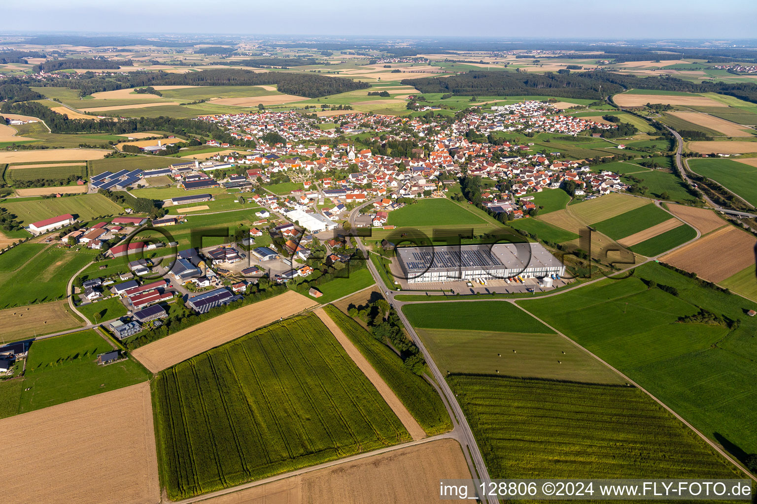 Aerial view of Building and production halls on the premises of Beurer GmbH in Uttenweiler in the state Baden-Wuerttemberg, Germany