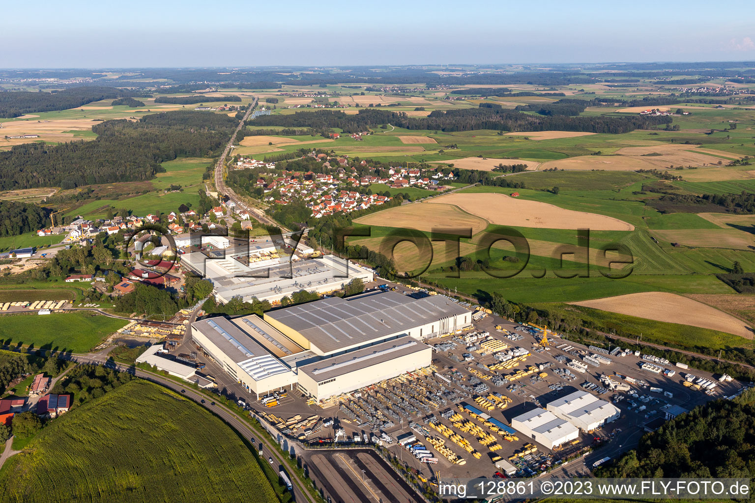 Building and production halls on the premises of Liebherr-Mischtechnik GmbH in Bad Schussenried in the state Baden-Wuerttemberg, Germany from above