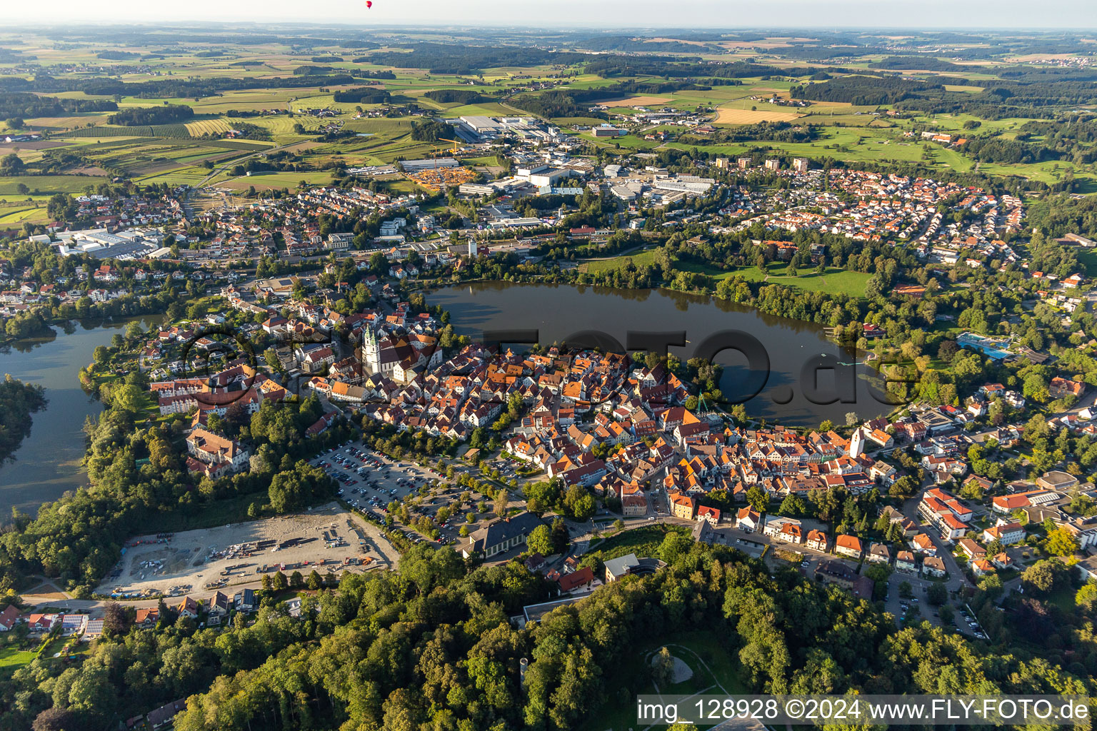 Oblique view of City view of the downtown area on the shore areas of Stadt See in Bad Waldsee in the state Baden-Wuerttemberg, Germany