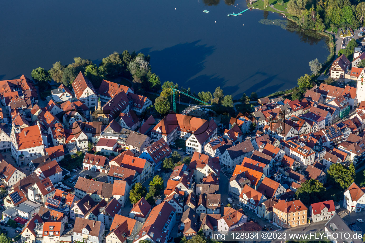 City view of the downtown area on the shore areas of Stadt See in Bad Waldsee in the state Baden-Wuerttemberg, Germany from above