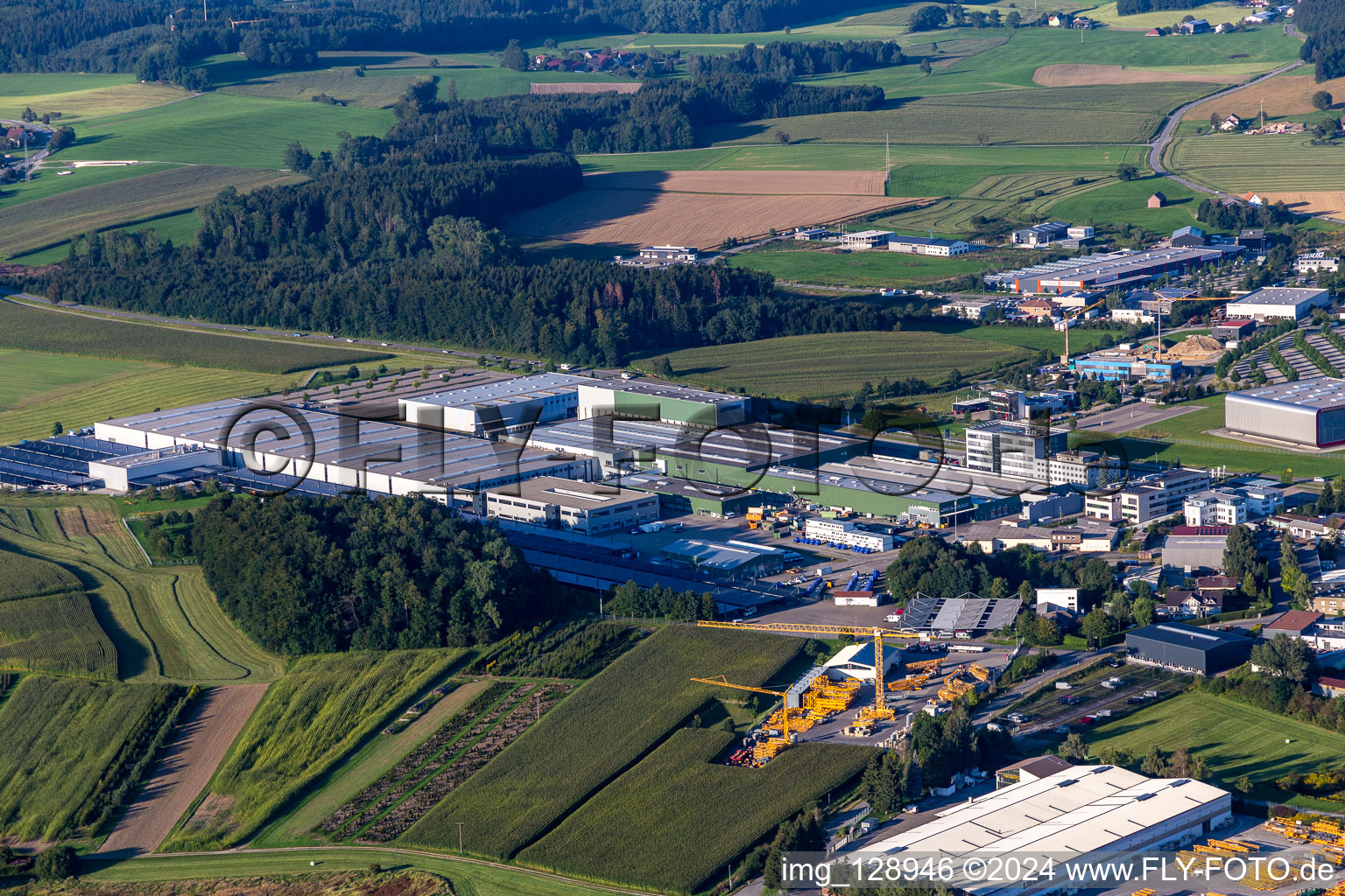 Buildings and production halls on the vehicle construction site of Hymer Reisemobile GmbH in Bad Waldsee in the state Baden-Wuerttemberg, Germany from the plane