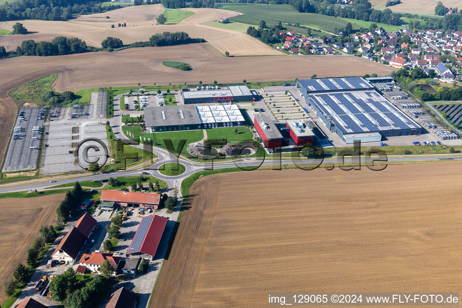 Oblique view of Buildings and production halls on the vehicle construction site of Carthago Reisemobilbau GmbH in Aulendorf in the state Baden-Wuerttemberg, Germany