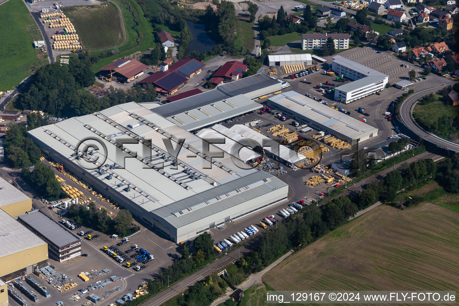 Drone image of Building and production halls on the premises of Liebherr-Mischtechnik GmbH in Bad Schussenried in the state Baden-Wuerttemberg, Germany