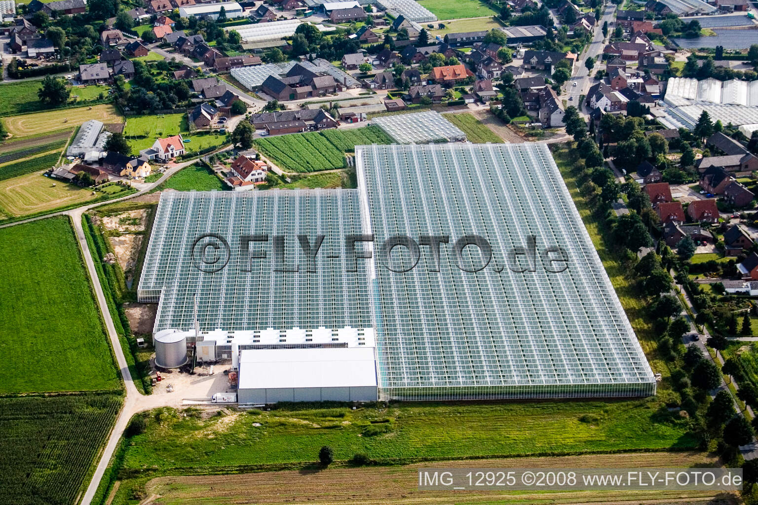 Glass roof surfaces in the greenhouse rows for Floriculture in Kerken in the state North Rhine-Westphalia, Germany