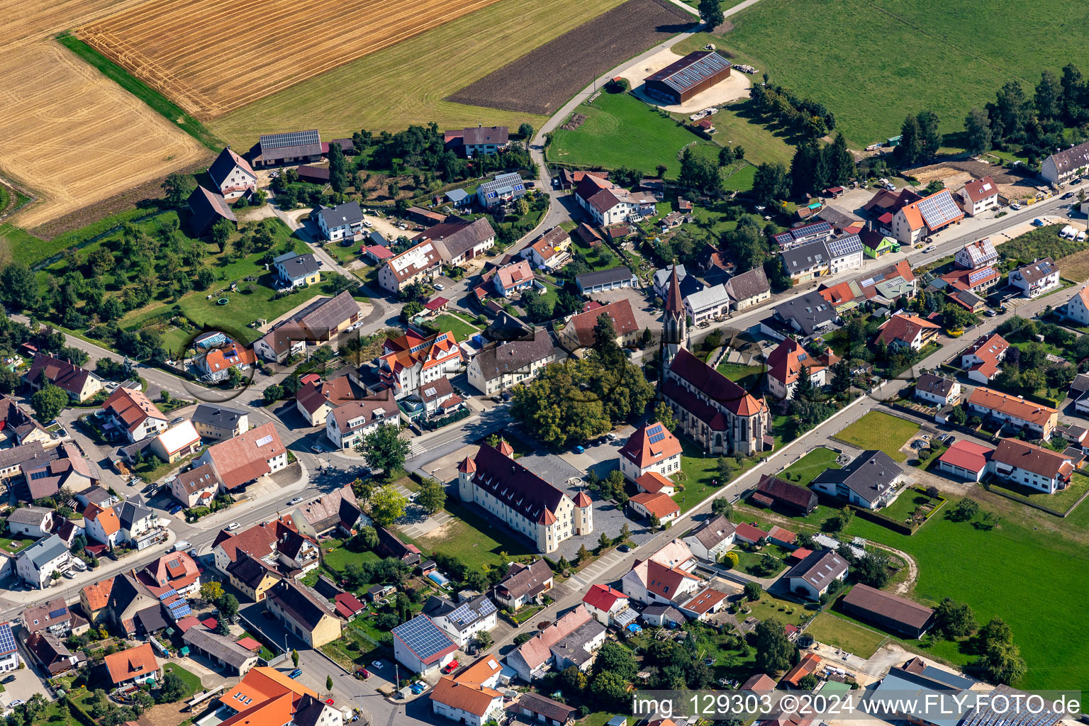 Town View of the streets and houses of the residential areas with with Town hall and Church St. Konrad in Langenenslingen in the state Baden-Wuerttemberg, Germany
