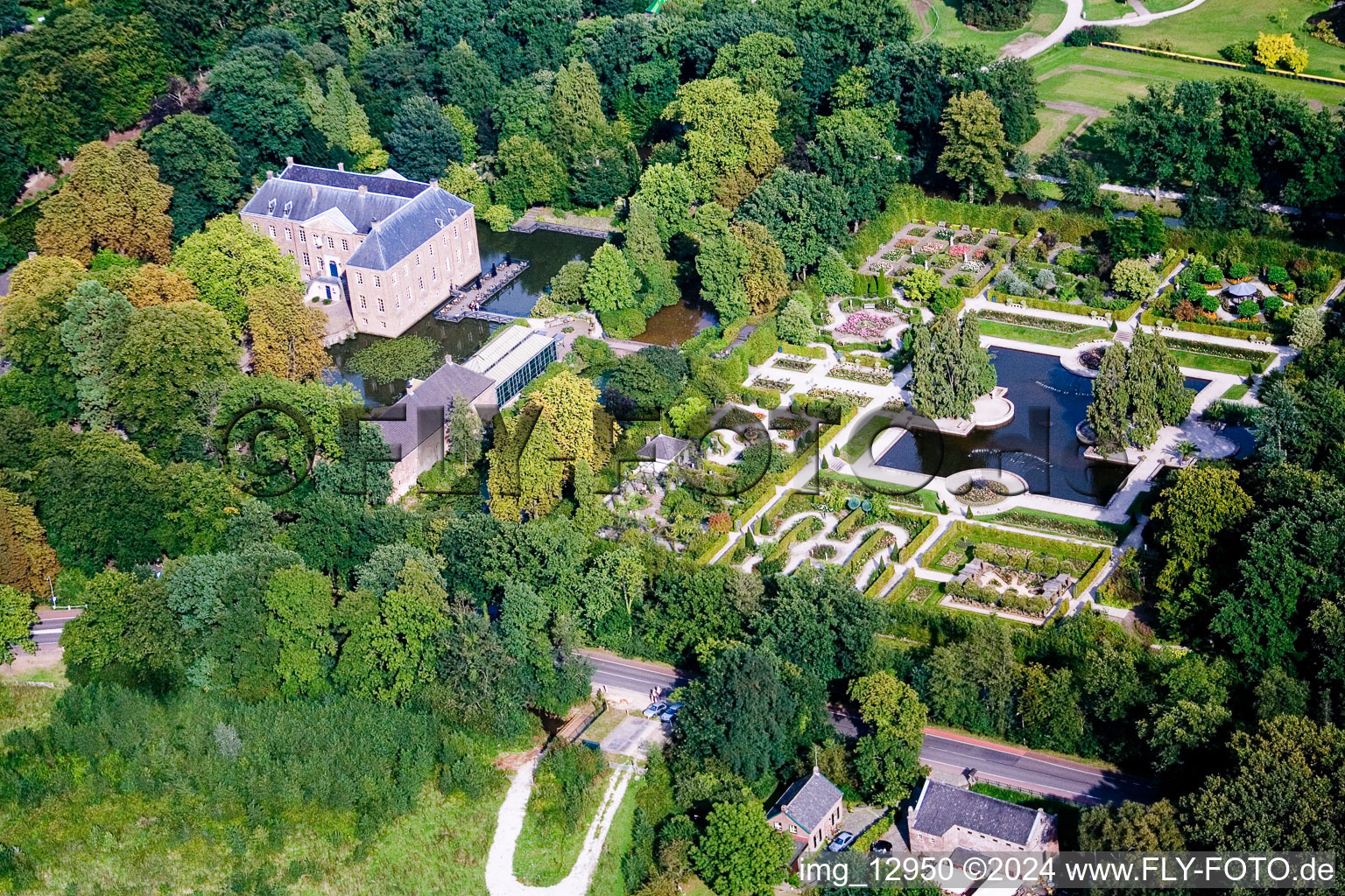 Aerial photograpy of Building and castle park systems of water castle Kasteeltuinen Arcen in Arcen in Limburg, Netherlands