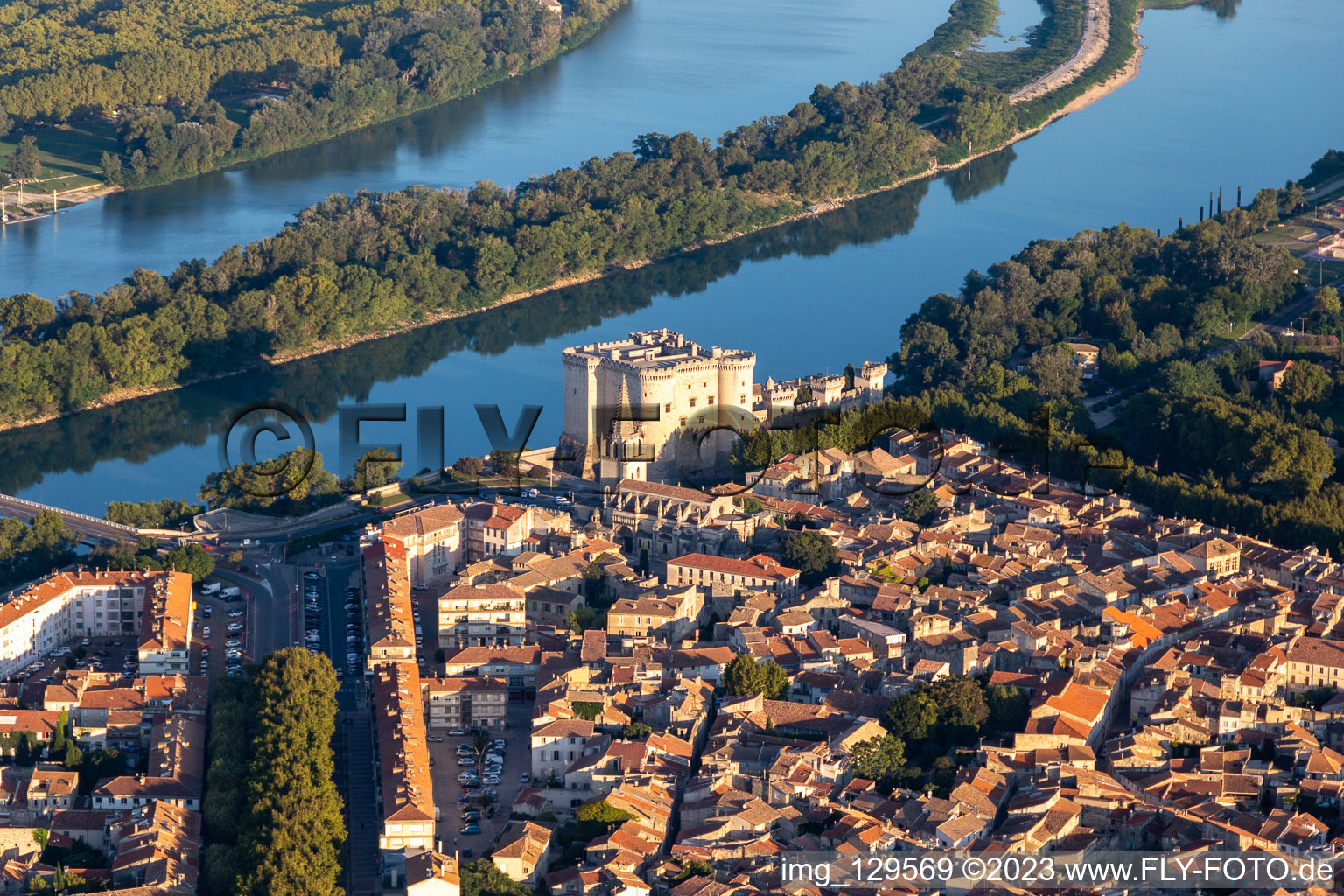 Aerial view of City view on the river bank of the river Rhone with castle Chateau de Tarascon in Tarascon in Provence-Alpes-Cote d'Azur, France