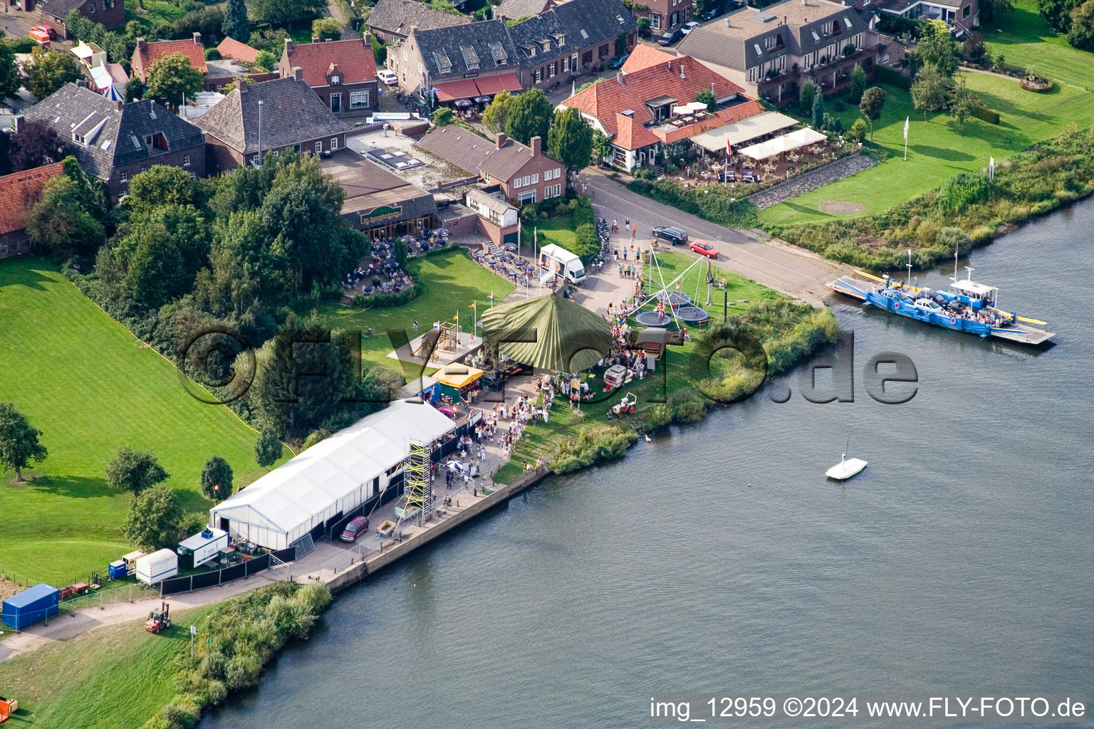 Ride a ferry ship of Autoveer Broekhuizen - Arcen about the Maas in Broekhuizen in Limburg, Netherlands