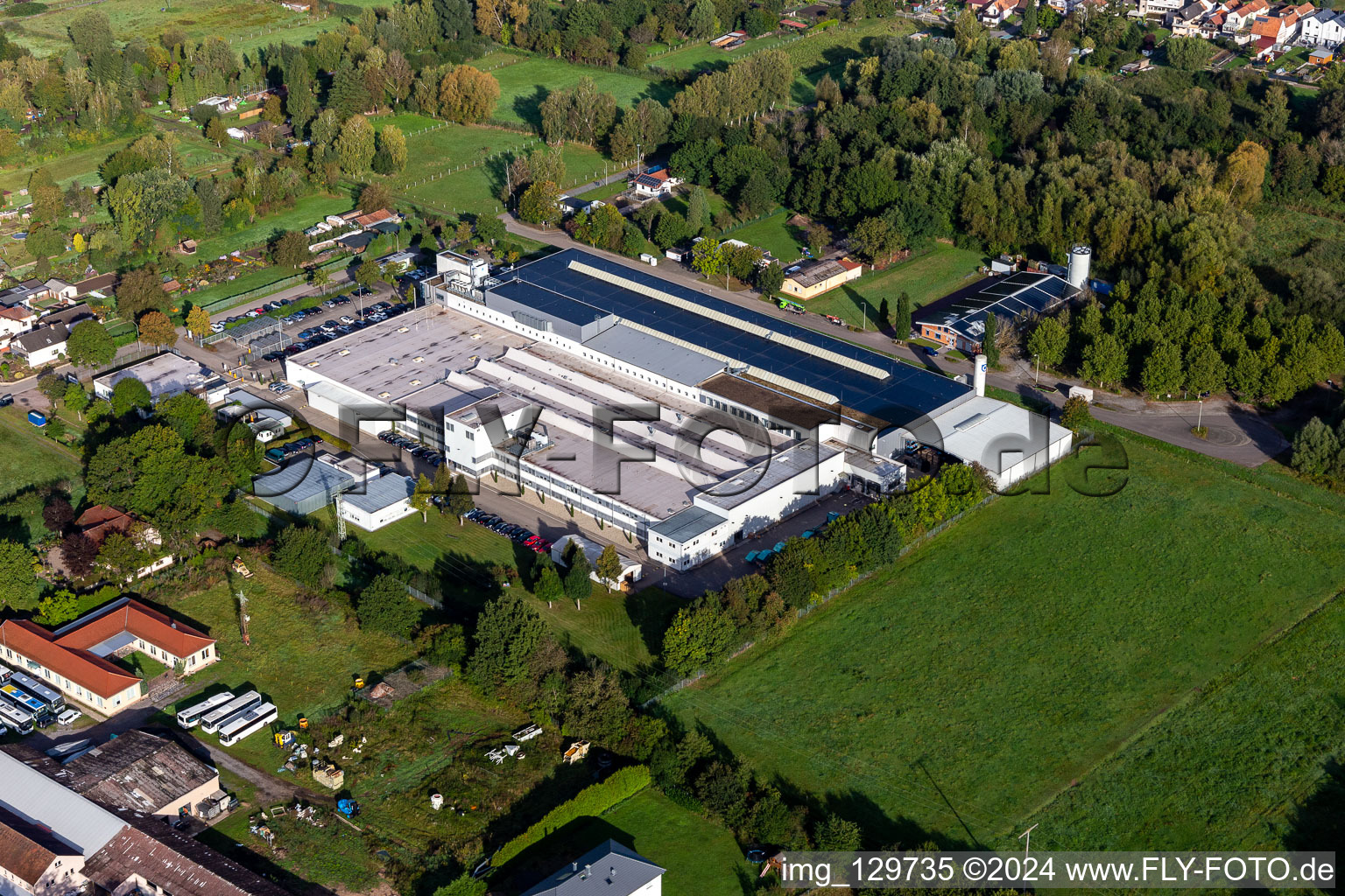 Oblique view of Building and production halls on the premises of Unternehmens Webasto Mechatronics in Schaidt in the state Rhineland-Palatinate, Germany