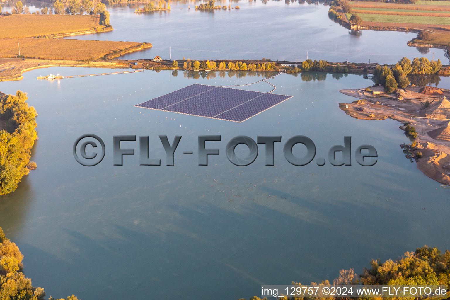 Floating photovoltaic island on gravel pond in Leimersheim in the state Rhineland-Palatinate, Germany