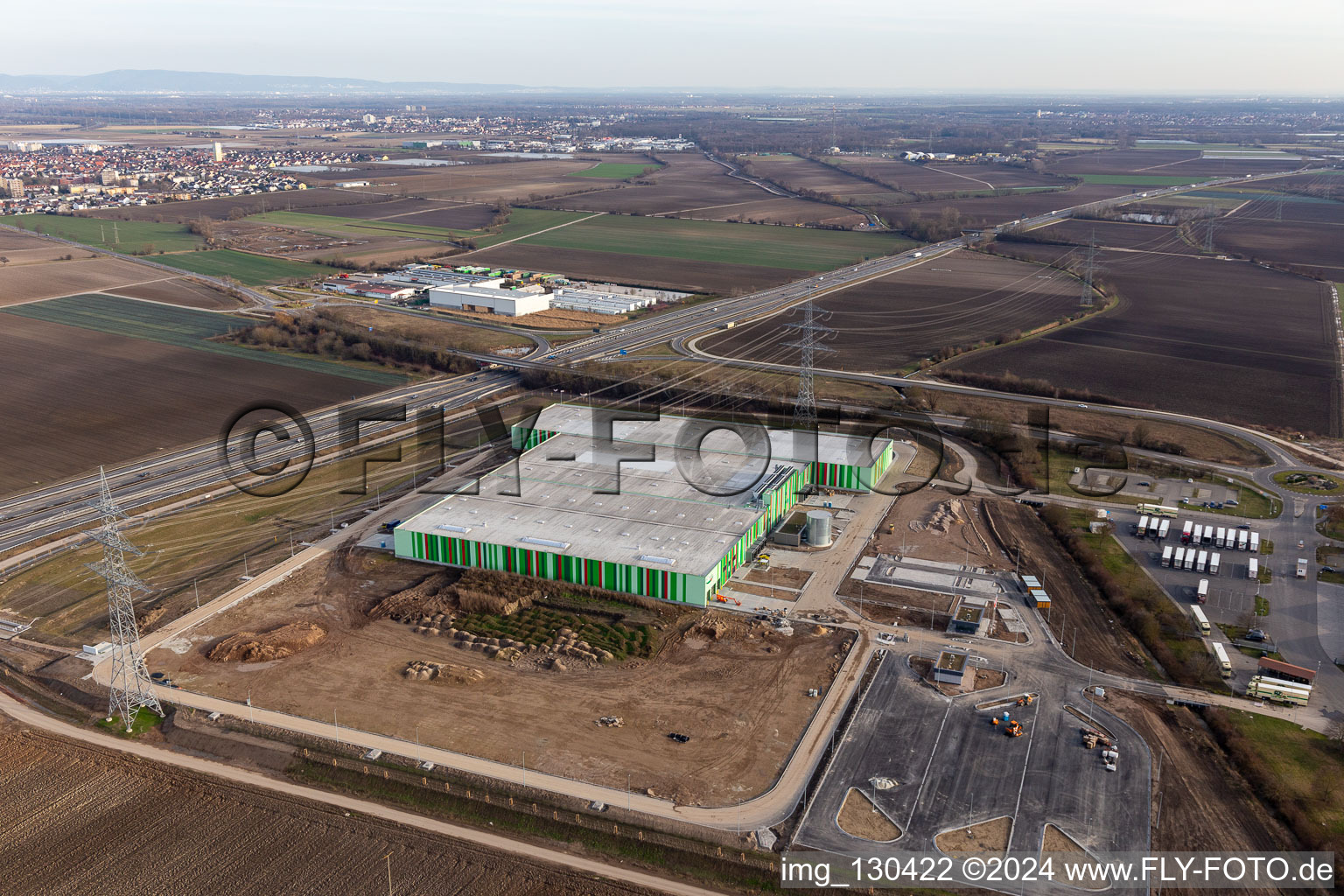 New building of the Pfalzmarkt for fruit and vegetables in Mutterstadt in the state Rhineland-Palatinate, Germany seen from above