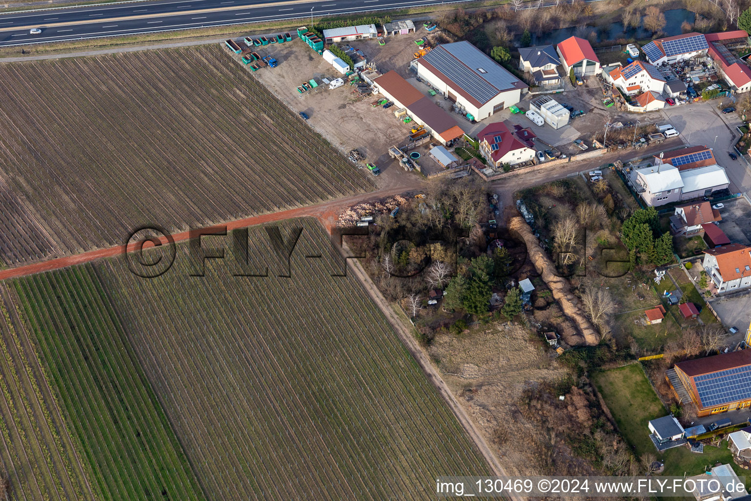 Aerial view of Commercial area in the Nauroth. Car tires discount Lid in Ellerstadt in the state Rhineland-Palatinate, Germany