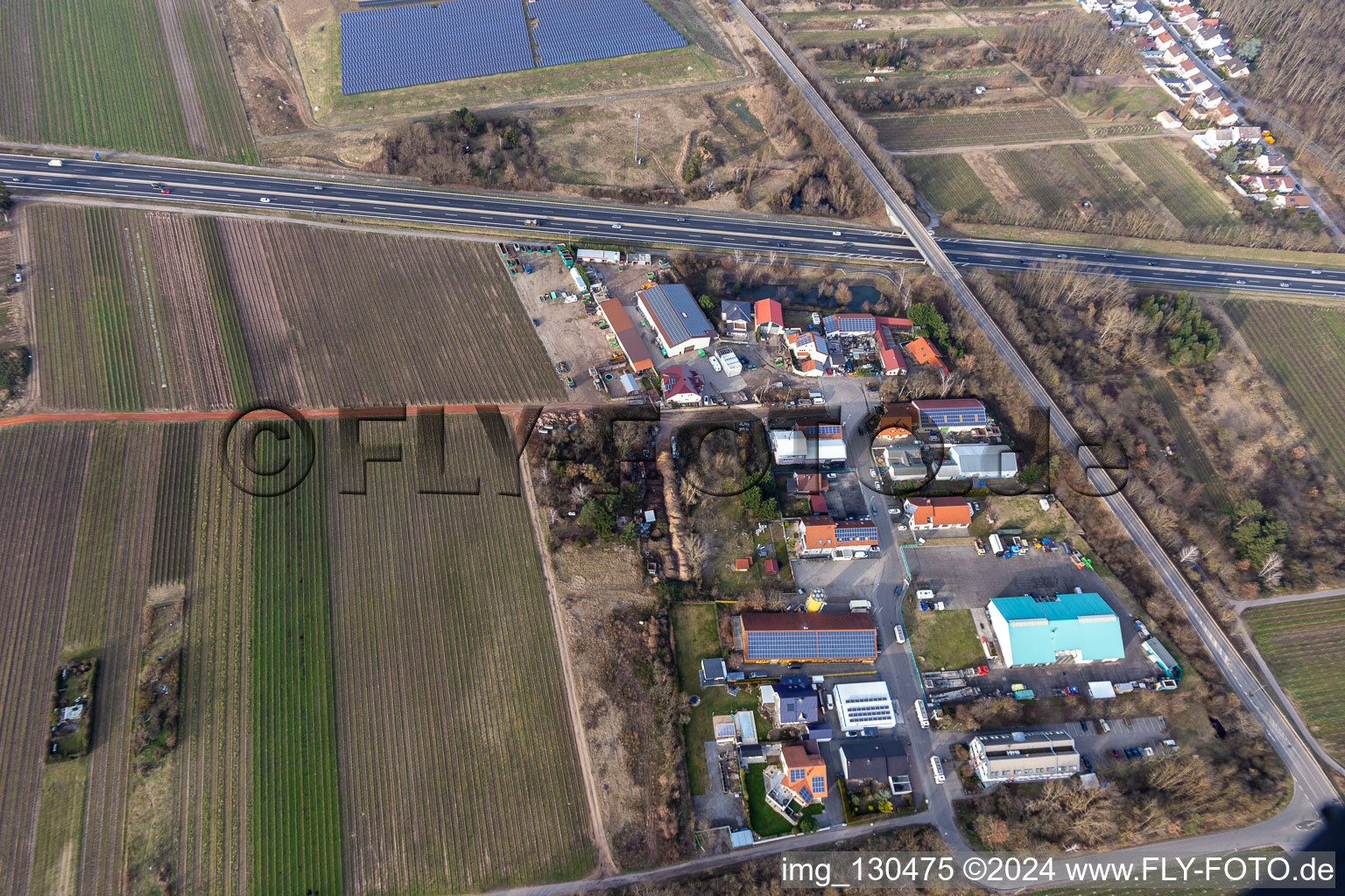 Industrial estate In der Nauroth in Ellerstadt in the state Rhineland-Palatinate, Germany seen from above