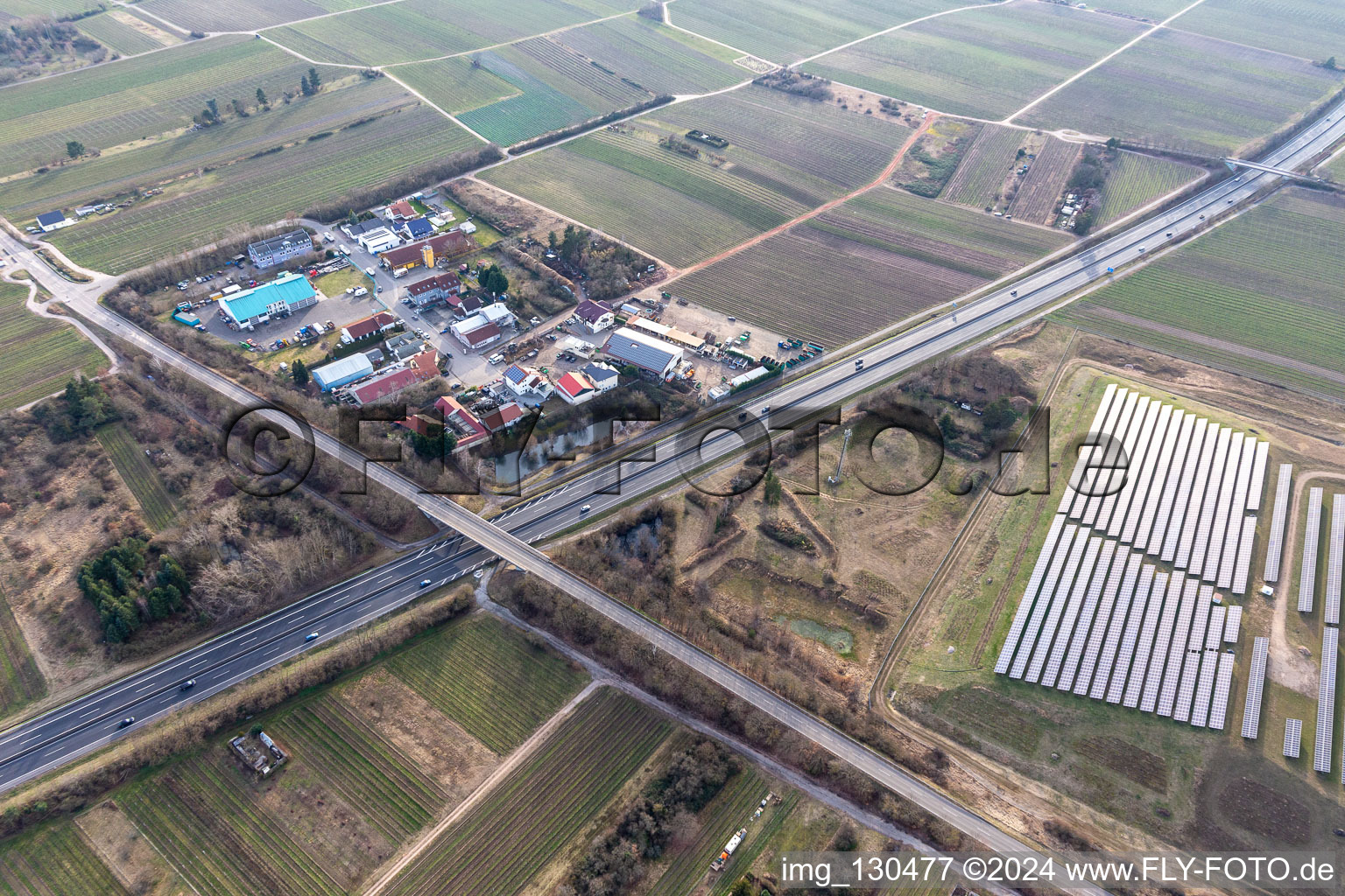 Industrial estate In der Nauroth in Ellerstadt in the state Rhineland-Palatinate, Germany from the plane