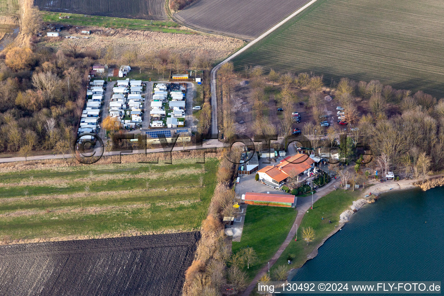 Camping Rallyfreunde Nachtweide eV. ; Gasthaus Fischerhütte at the Lambsheimer Weiher in Lambsheim in the state Rhineland-Palatinate, Germany