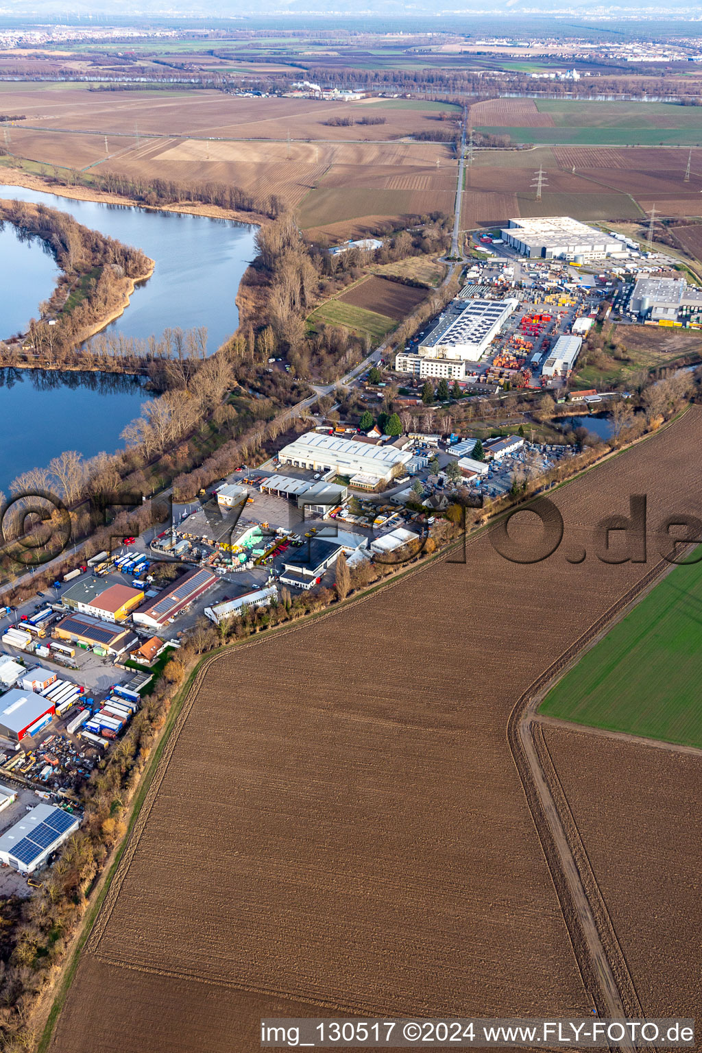 Industrial street with industrial area at Silbersee in the district Roxheim in Bobenheim-Roxheim in the state Rhineland-Palatinate, Germany