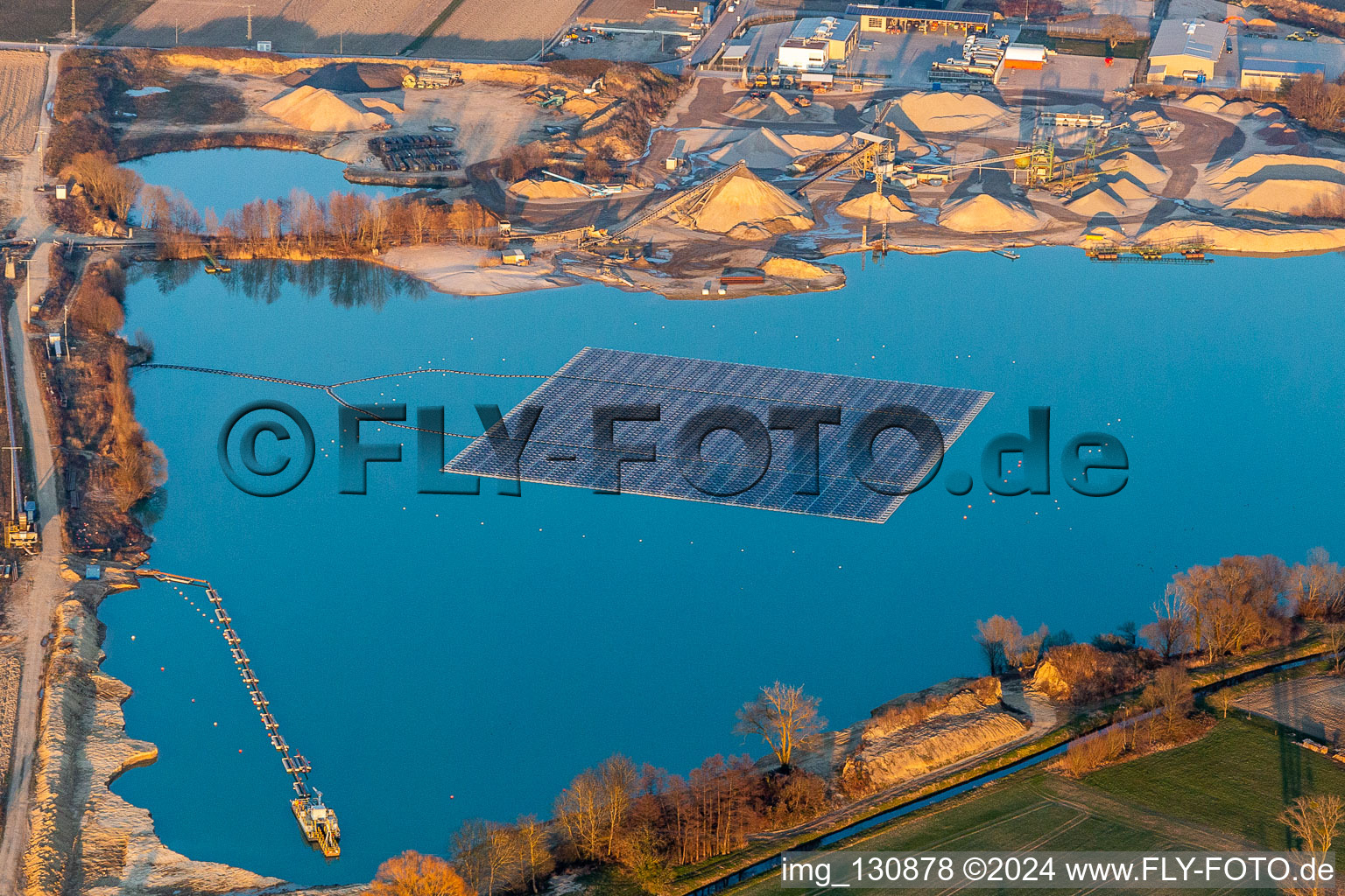 Oblique view of Floating photovoltaic island on the lake in Leimersheim in the state Rhineland-Palatinate, Germany