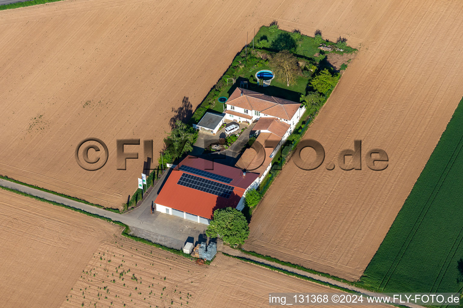 Oblique view of Bioland Neuspergerhof winery in Rohrbach in the state Rhineland-Palatinate, Germany