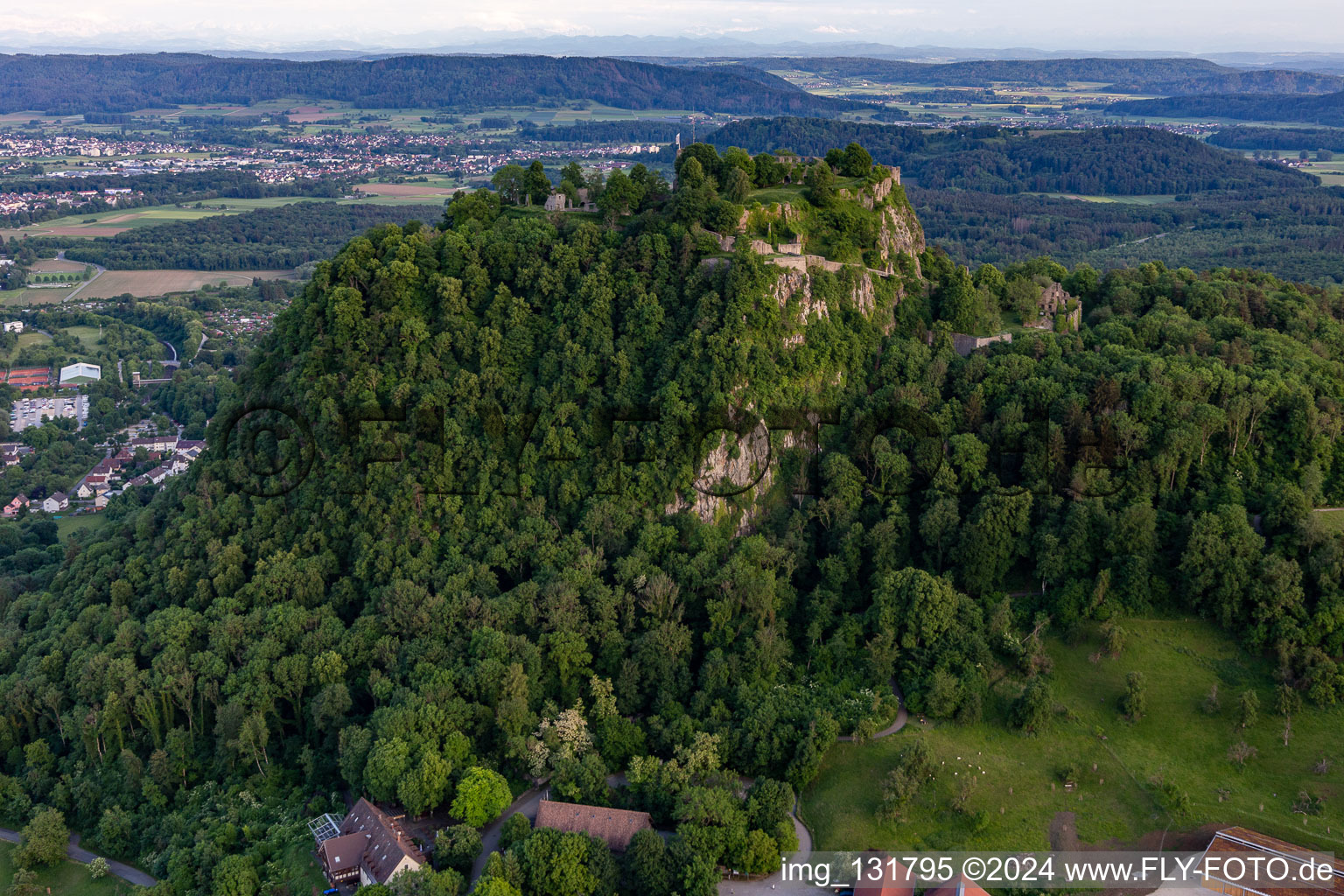 Aerial photograpy of Hohentwiel with fortress ruins from 914 and panoramic views is an extinct volcano in Singen in the state Baden-Wuerttemberg, Germany