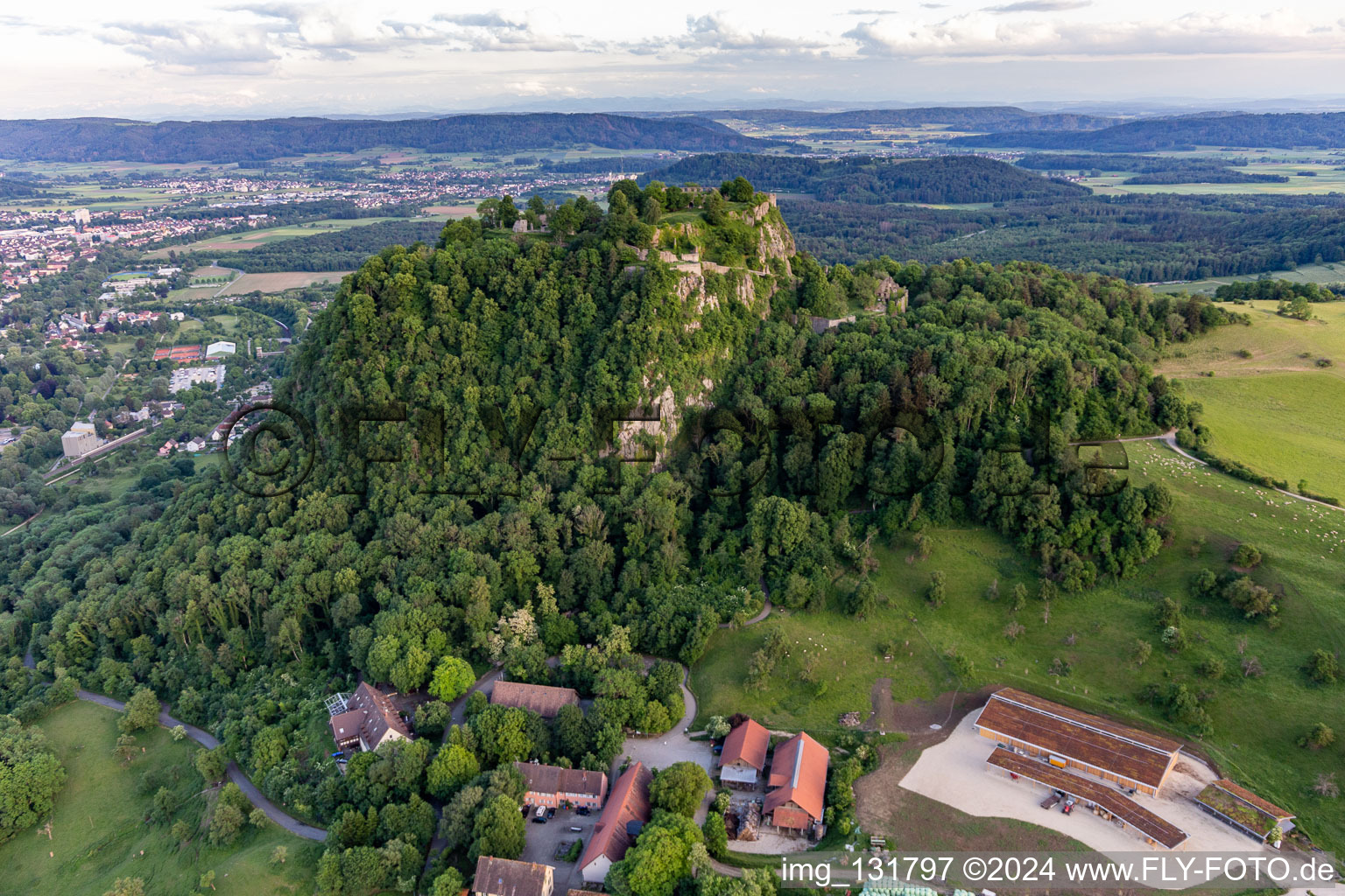 Oblique view of Hohentwiel with fortress ruins from 914 and panoramic views is an extinct volcano in Singen in the state Baden-Wuerttemberg, Germany