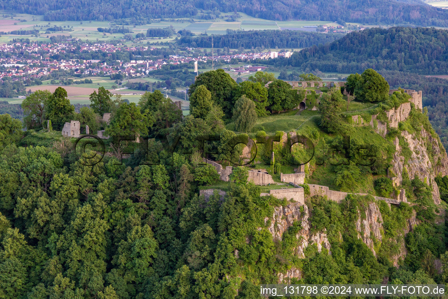 Hohentwiel with fortress ruins from 914 and panoramic views is an extinct volcano in Singen in the state Baden-Wuerttemberg, Germany from above