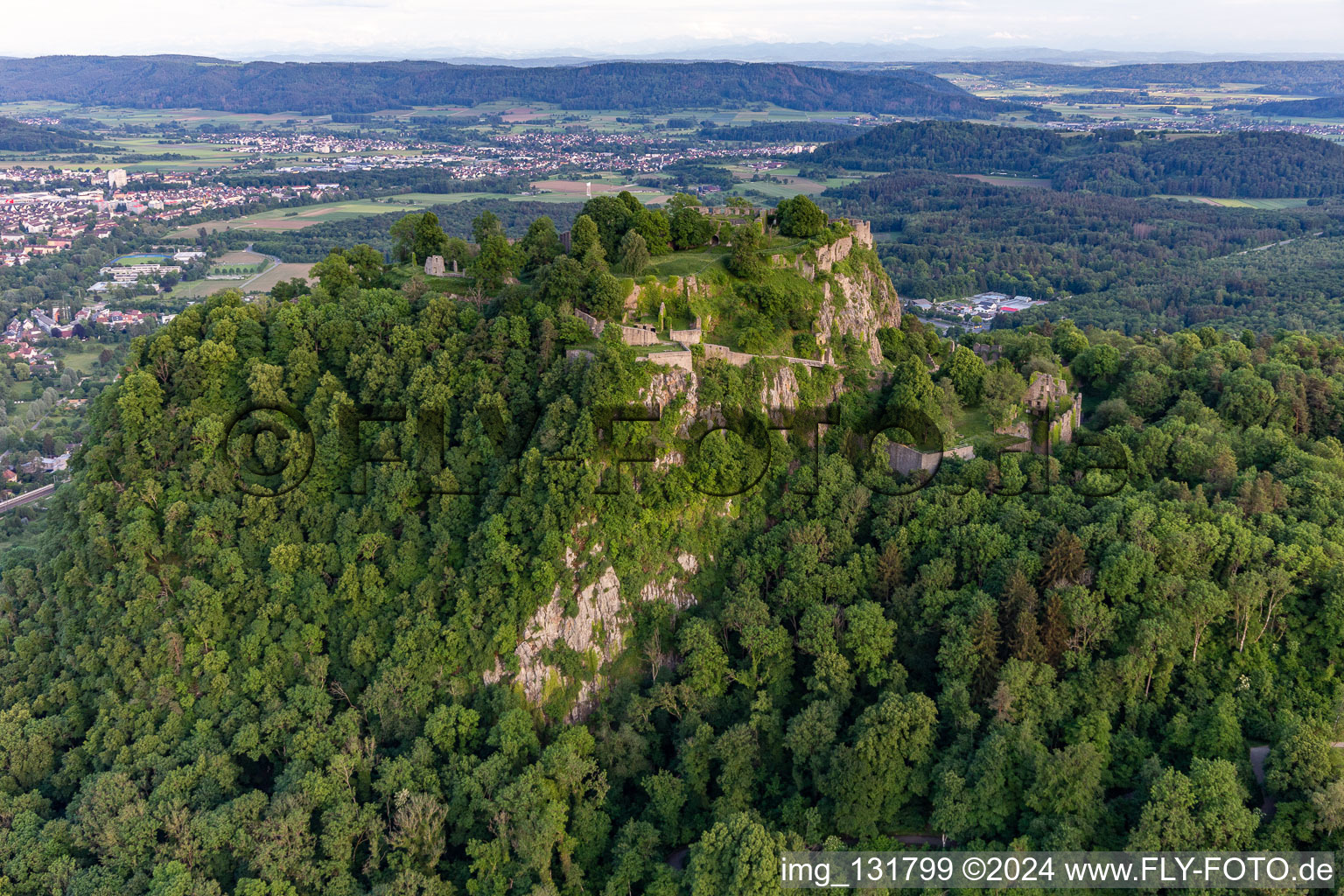 Hohentwiel with fortress ruins from 914 and panoramic views is an extinct volcano in Singen in the state Baden-Wuerttemberg, Germany out of the air