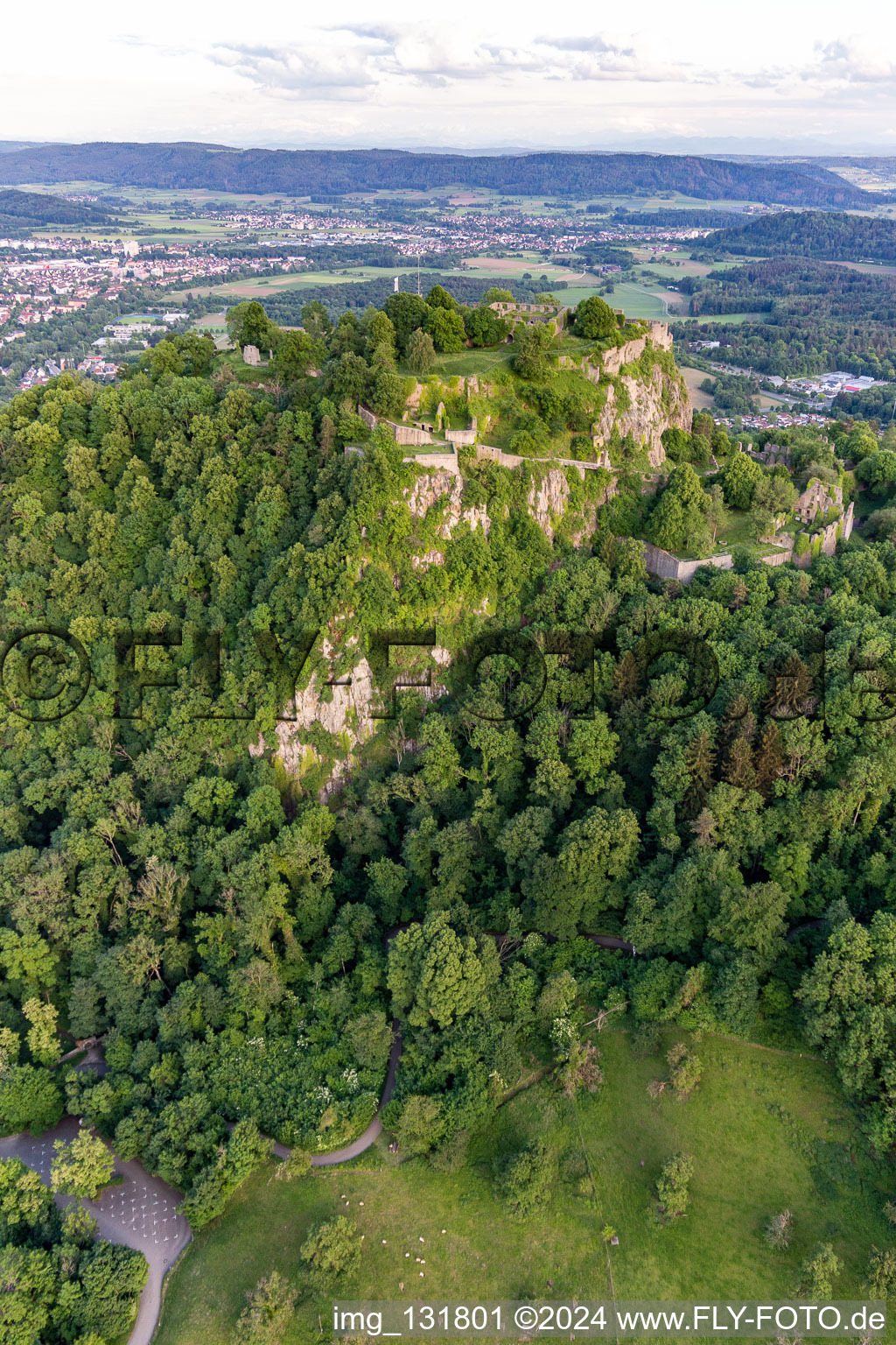 Hohentwiel with fortress ruins from 914 and panoramic views is an extinct volcano in Singen in the state Baden-Wuerttemberg, Germany seen from above