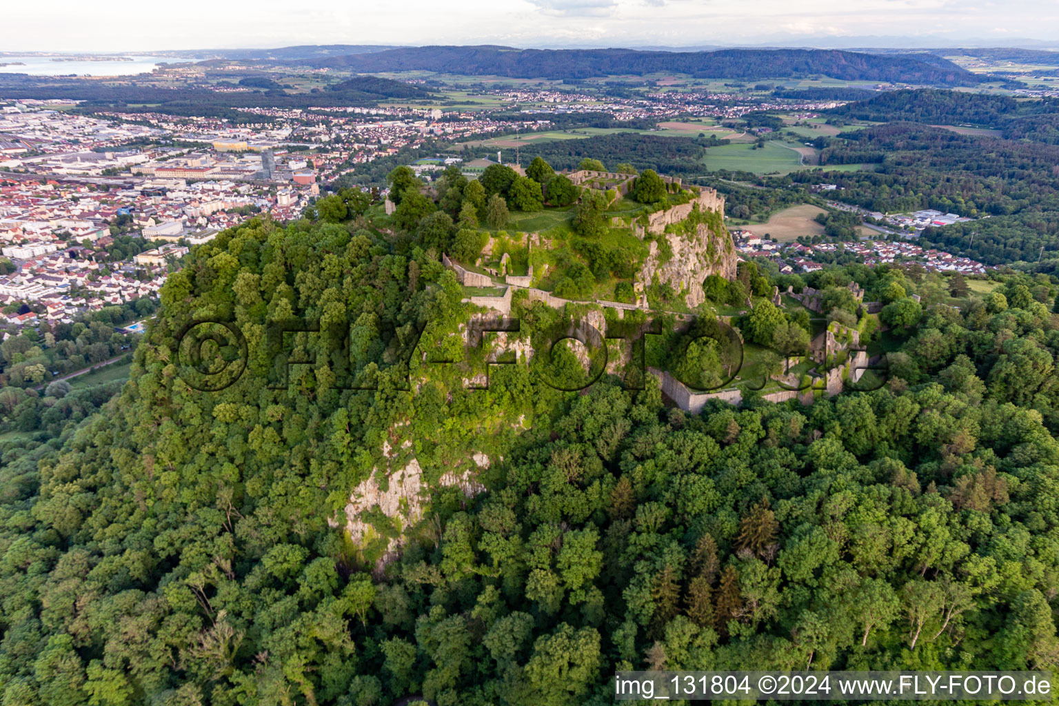 Bird's eye view of Hohentwiel with fortress ruins from 914 and panoramic views is an extinct volcano in Singen in the state Baden-Wuerttemberg, Germany