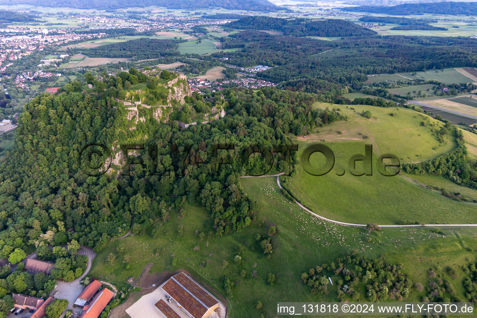 Aerial view of Hotel Restaurant Hohentwiel on the Hohentwiel with fortress ruins from 914 and panoramic views is an extinct volcano in Singen in the state Baden-Wuerttemberg, Germany