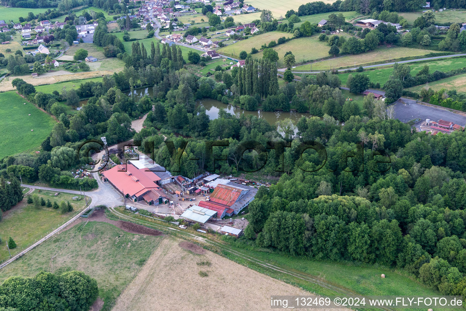 Tourist train and Muséotrain de Semur-en-Vallon, en Sarthe in Semur-en-Vallon in the state Sarthe, France from above