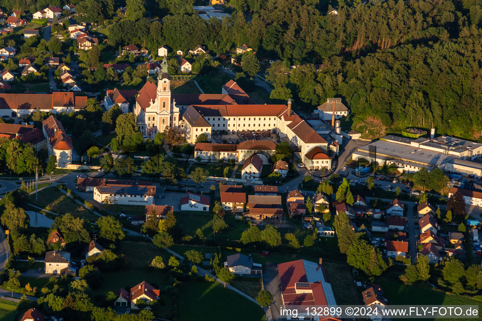 The former abbey church of the Assumption of Mary and monastery courtyard Aldersbach with Aldersbacher Bräustüberl in the district Sankt Peter in Aldersbach in the state Bavaria, Germany