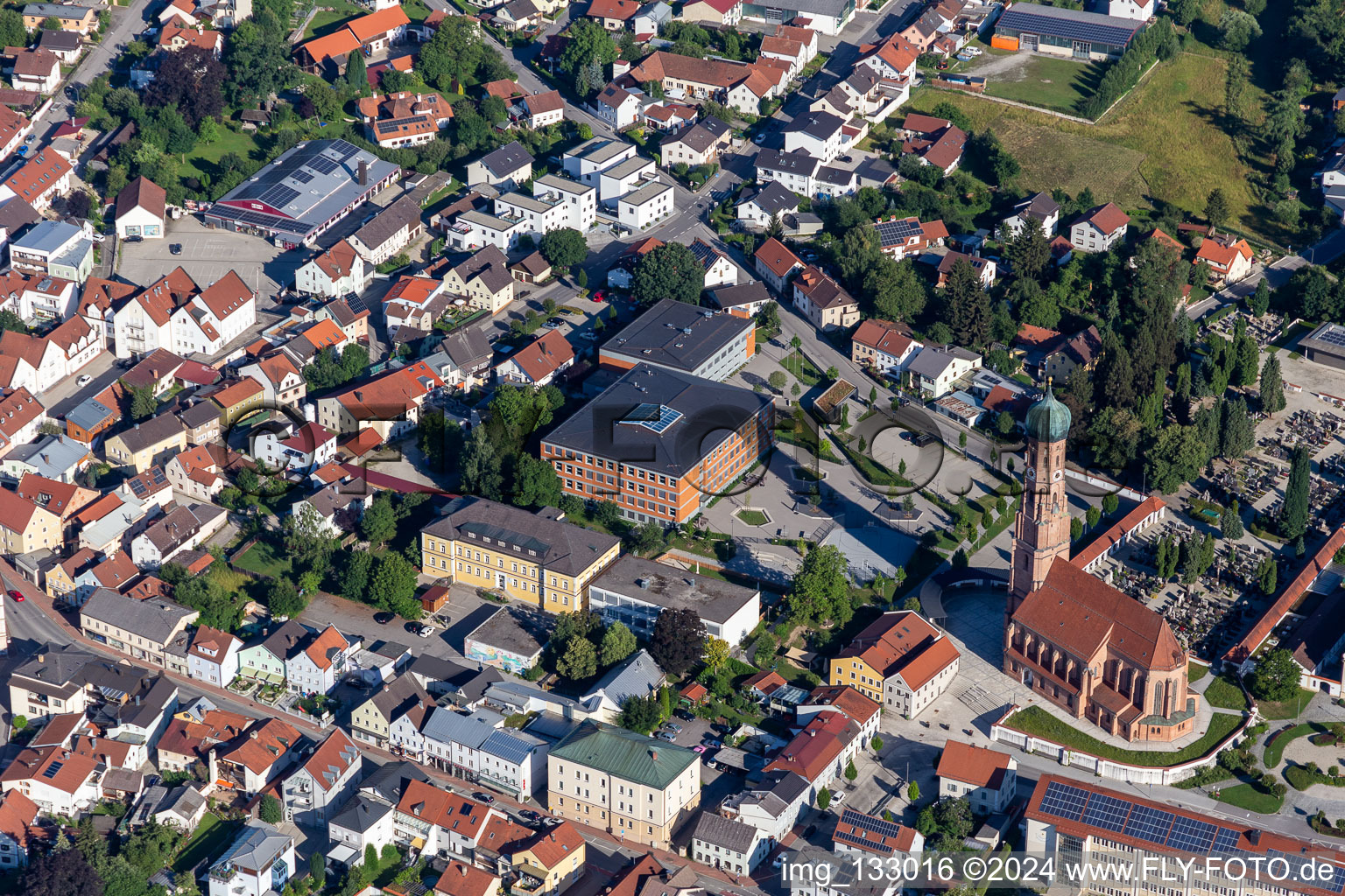 Parish Church of the Assumption of Mary and Middle School in Vilsbiburg in the state Bavaria, Germany