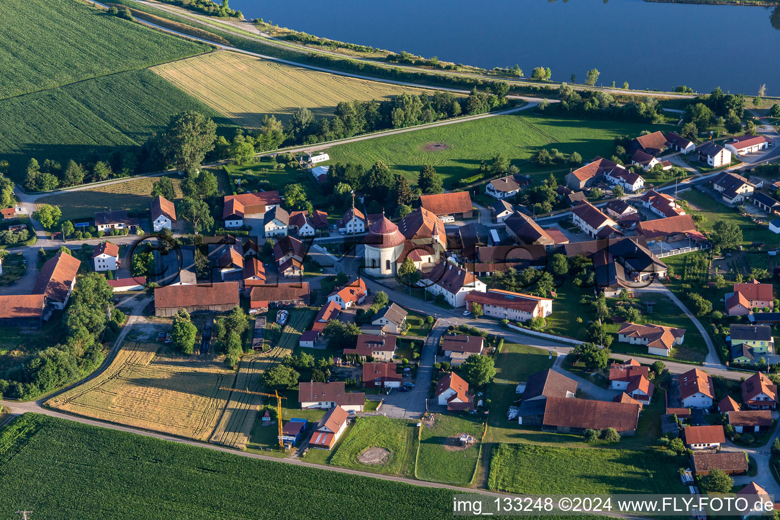 Oblique view of Pilgrimage Church of the Holy Blood in Niederachdorf in the district Niederachdorf in Kirchroth in the state Bavaria, Germany