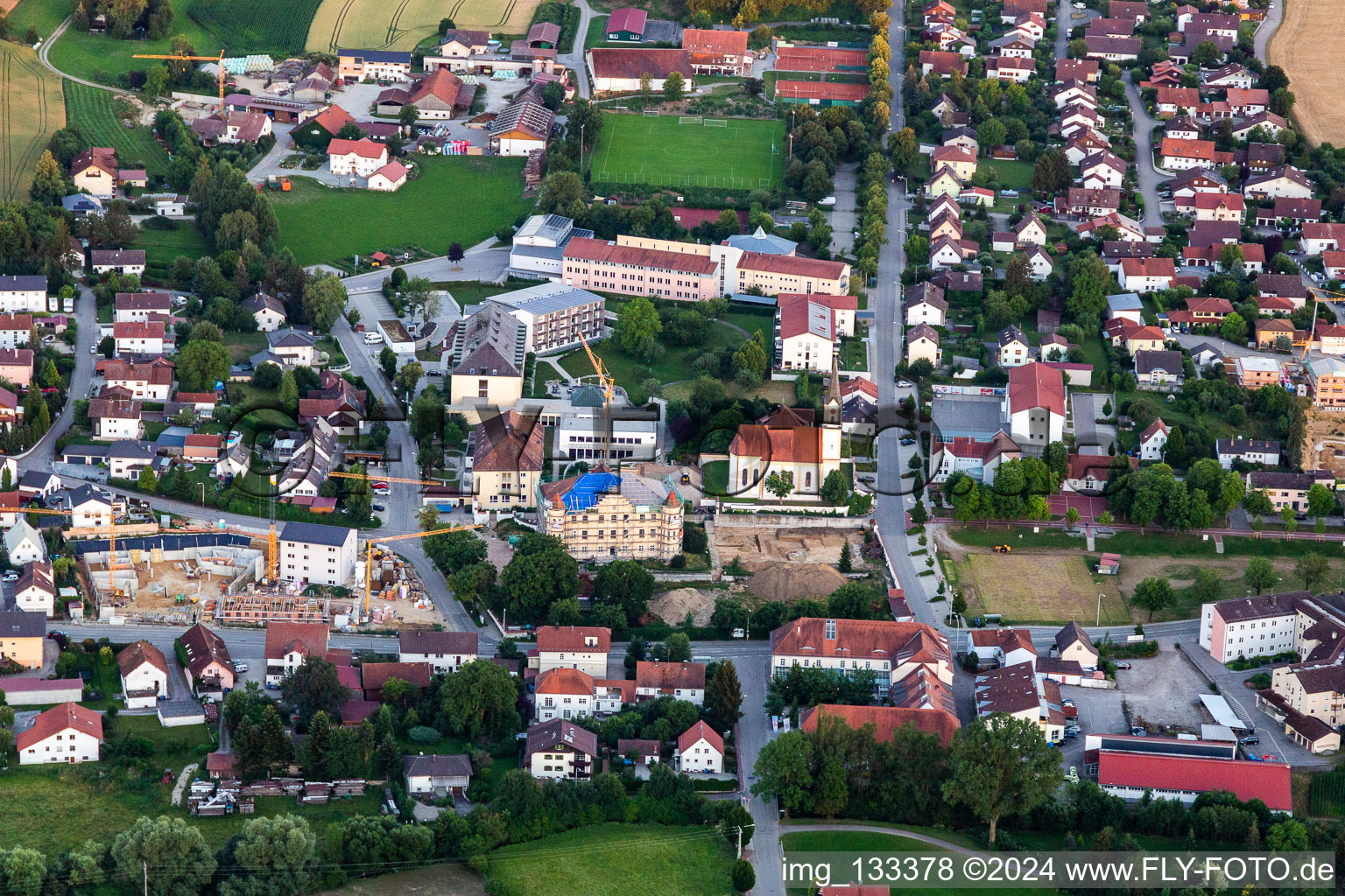 Church of the Annunciation and PhysioKlinik im Aitrachtal GmbH in the district Weichshofen in Mengkofen in the state Bavaria, Germany