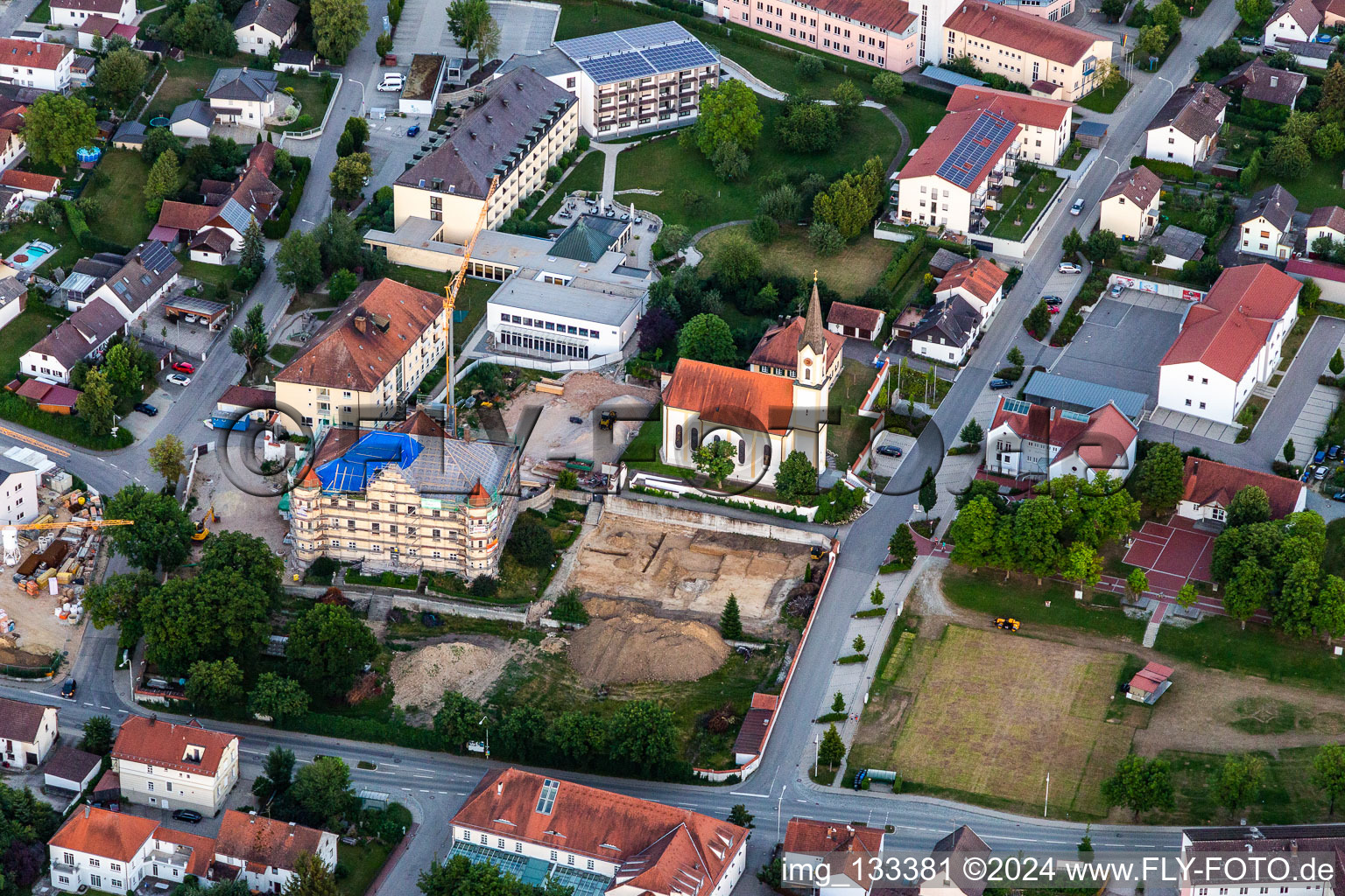 Aerial view of Church of the Annunciation and PhysioKlinik im Aitrachtal GmbH in the district Weichshofen in Mengkofen in the state Bavaria, Germany