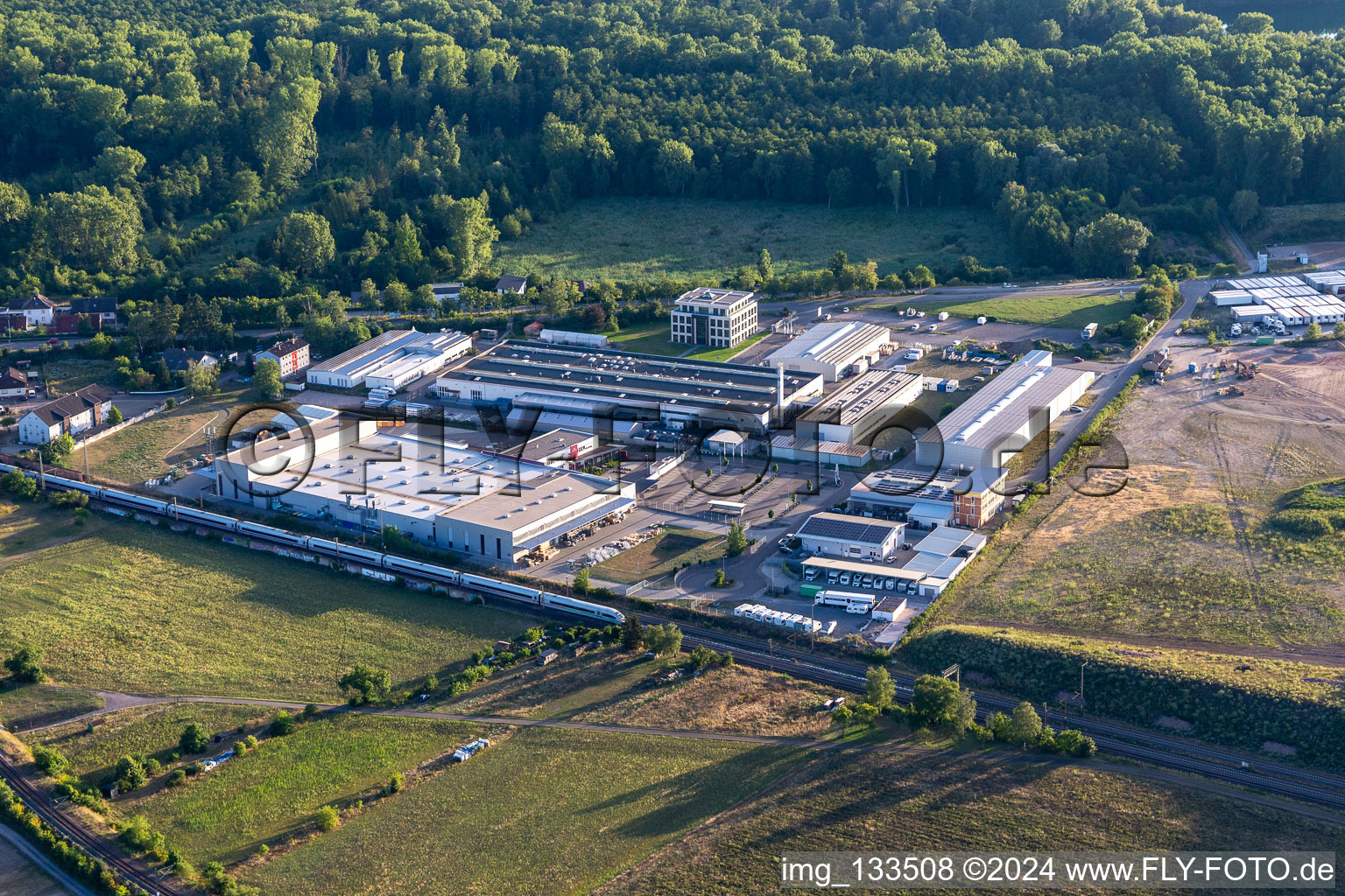 Siemensstraße industrial area with Hartmann & König Stromzuführungs AG and Tombor GmbH in the district Neudorf in Graben-Neudorf in the state Baden-Wuerttemberg, Germany