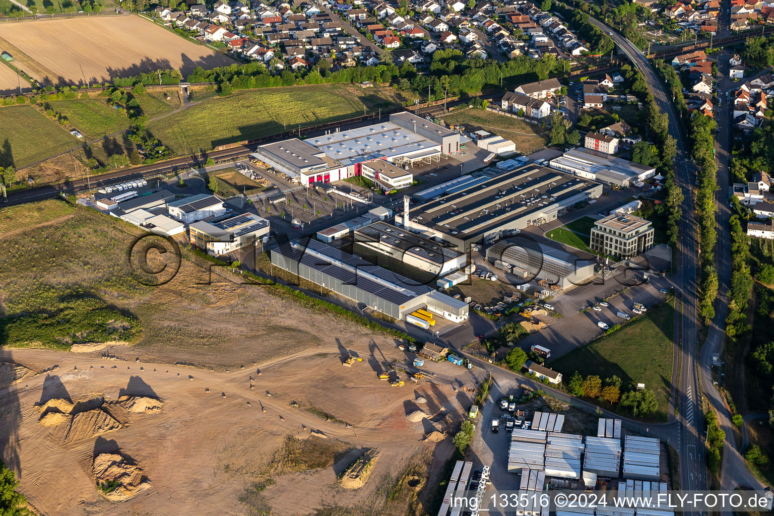 Oblique view of Siemensstraße industrial area with Hartmann & König Stromzuführungs AG and Tombor GmbH in the district Neudorf in Graben-Neudorf in the state Baden-Wuerttemberg, Germany