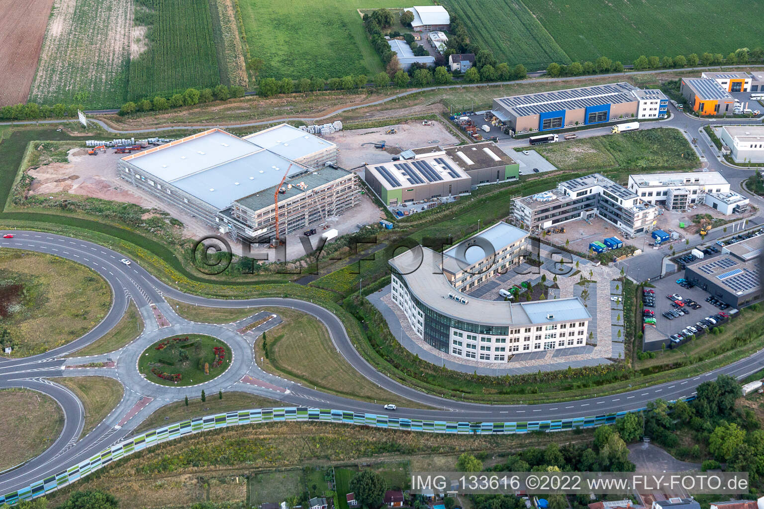 Business park at the exhibition center in the district Queichheim in Landau in der Pfalz in the state Rhineland-Palatinate, Germany seen from above