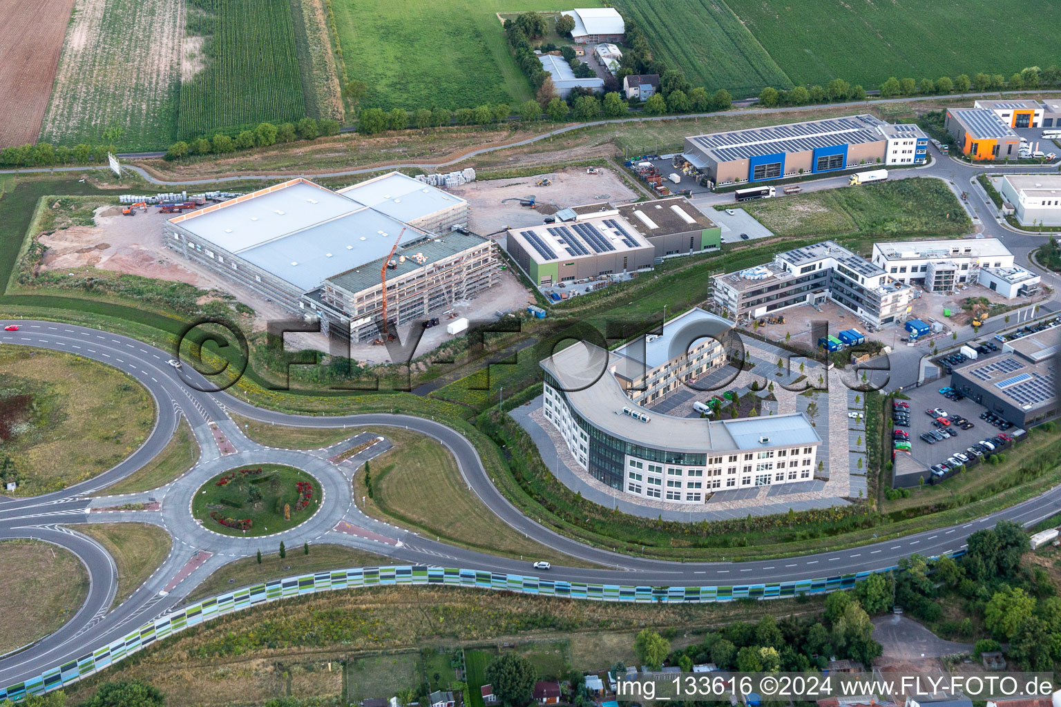 Business park at the exhibition center in the district Queichheim in Landau in der Pfalz in the state Rhineland-Palatinate, Germany seen from above