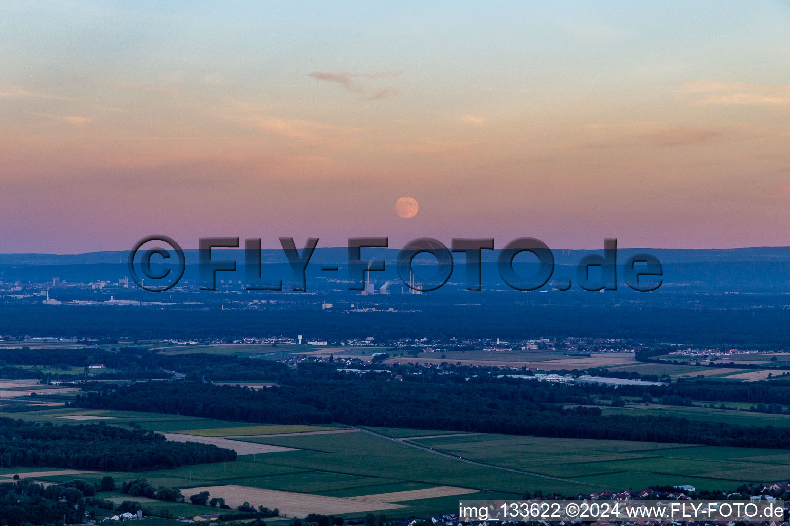 Moonrise over the Bienwald in Rohrbach in the state Rhineland-Palatinate, Germany