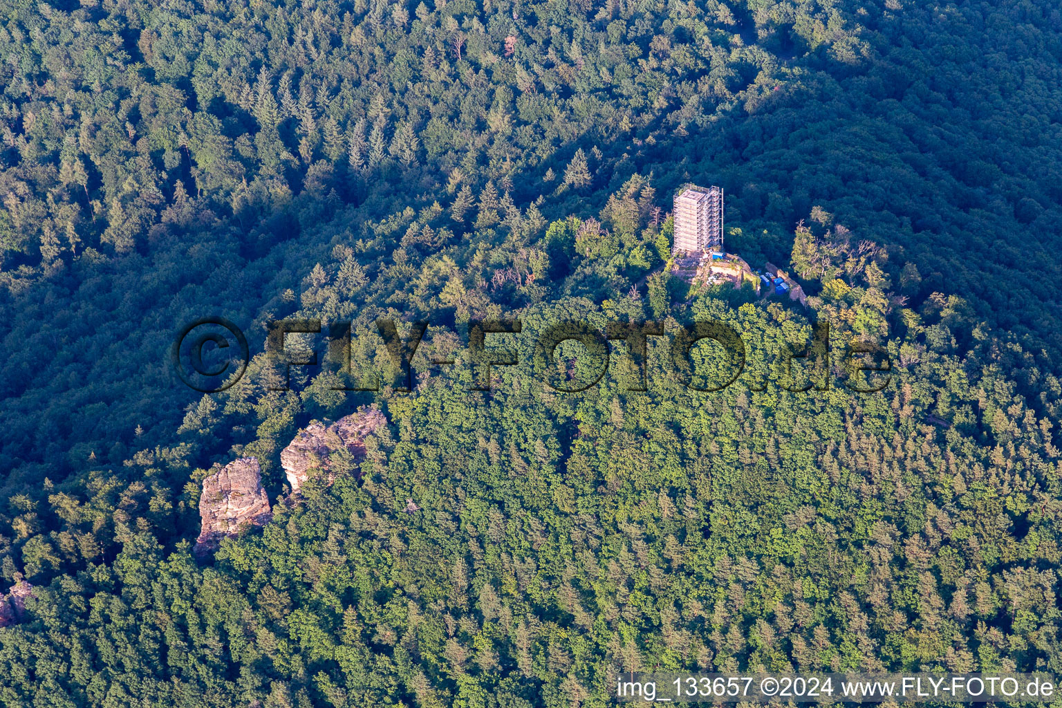 Aerial view of Scharfenberg castle ruins with scaffolding in Leinsweiler in the state Rhineland-Palatinate, Germany