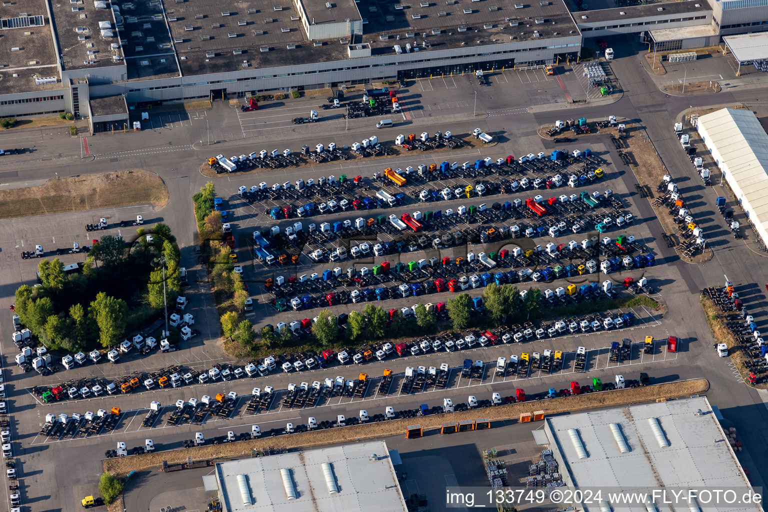 Parked new trucks at the Mercedes-Benz plant in Wörth of Daimler Truck AG in the district Maximiliansau in Wörth am Rhein in the state Rhineland-Palatinate, Germany