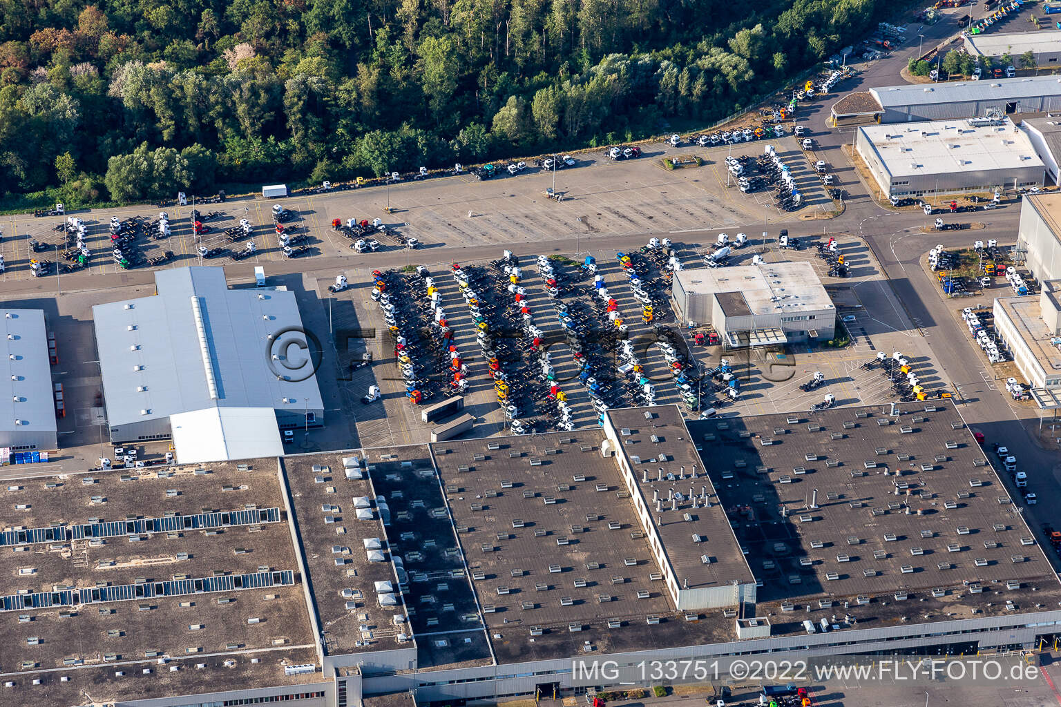 Aerial view of Parked new trucks in the Mercedes-Benz Wörth plant of Daimler Truck AG in the district Maximiliansau in Wörth am Rhein in the state Rhineland-Palatinate, Germany