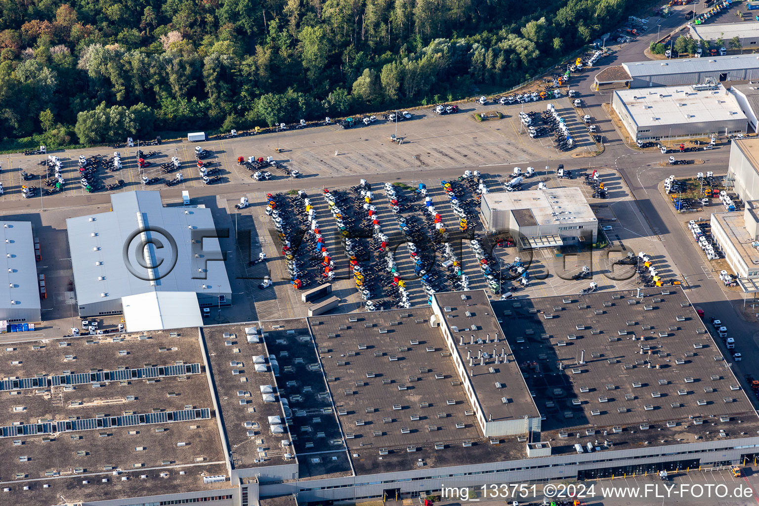 Aerial view of Parked new trucks at the Mercedes-Benz plant in Wörth of Daimler Truck AG in the district Maximiliansau in Wörth am Rhein in the state Rhineland-Palatinate, Germany