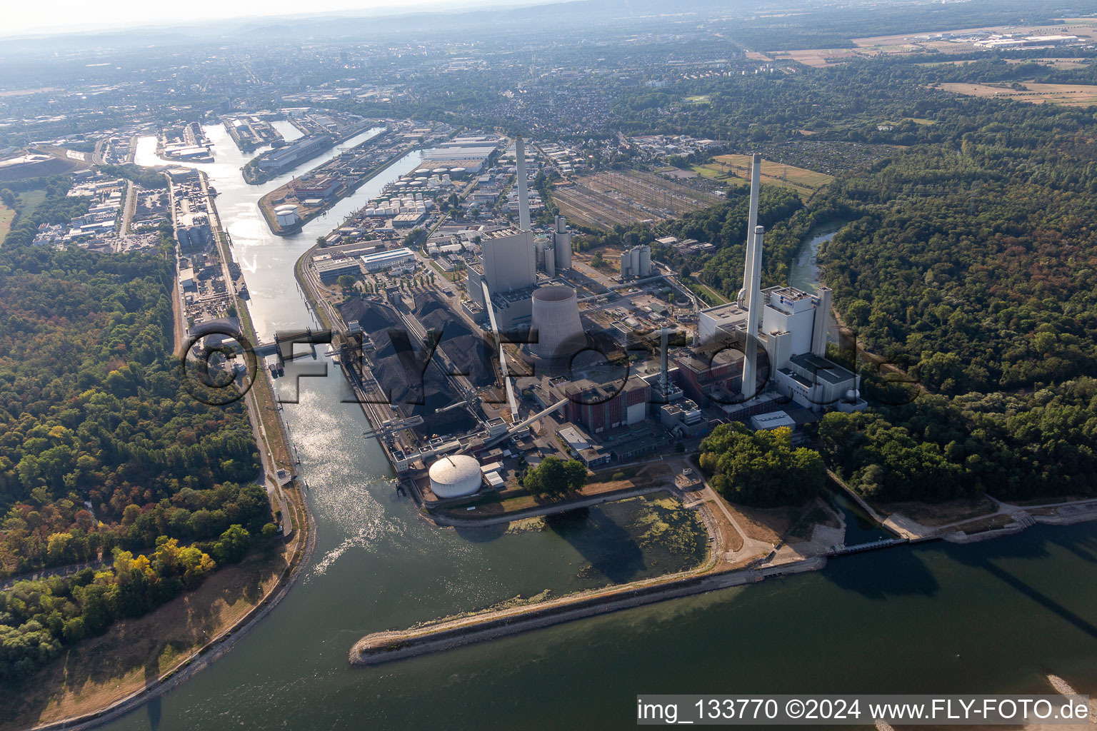 Aerial view of EnBW's Rhine port steam power plant throttled due to low water levels in the Rhine in the district Daxlanden in Karlsruhe in the state Baden-Wuerttemberg, Germany