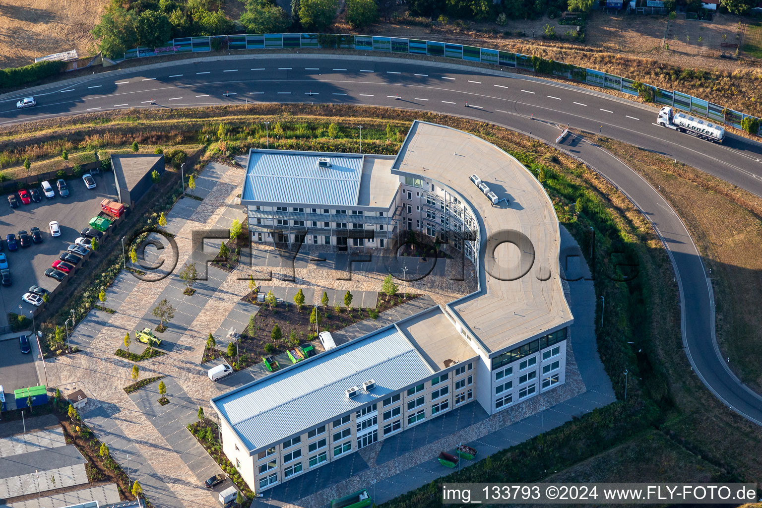 New commercial building in Hermann-Staudinger-Straße in the district Queichheim in Landau in der Pfalz in the state Rhineland-Palatinate, Germany