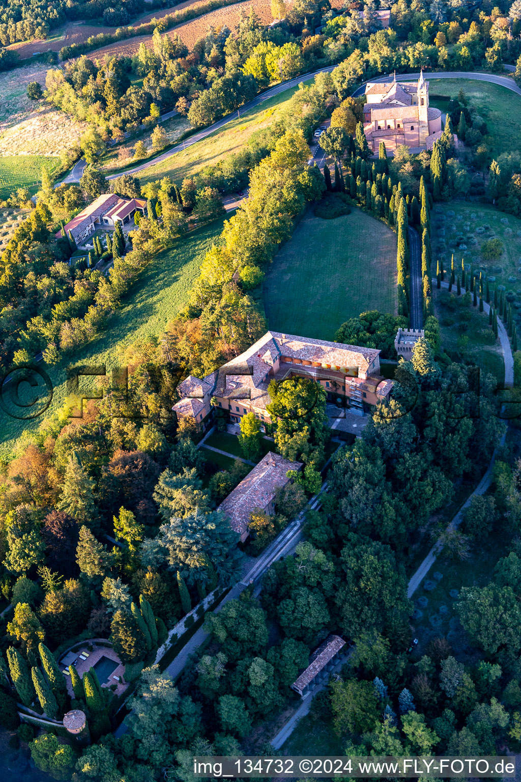 Church of the Nativity of the Beata Vergine Maria in Albinea in the state Reggio Emilia, Italy from above